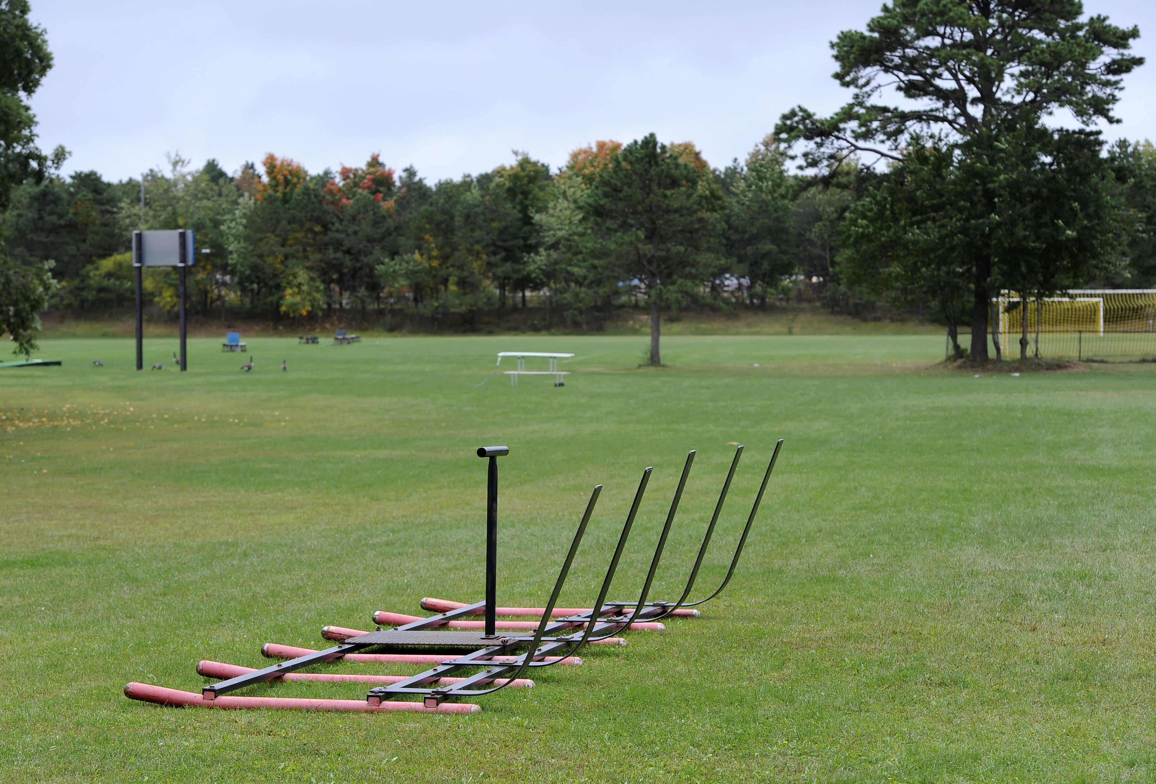 Equipment sits on a football practice field near the main entrance for Shoreham-Wading River High School on Oct. 2, 2014, in Shoreham, N.Y.