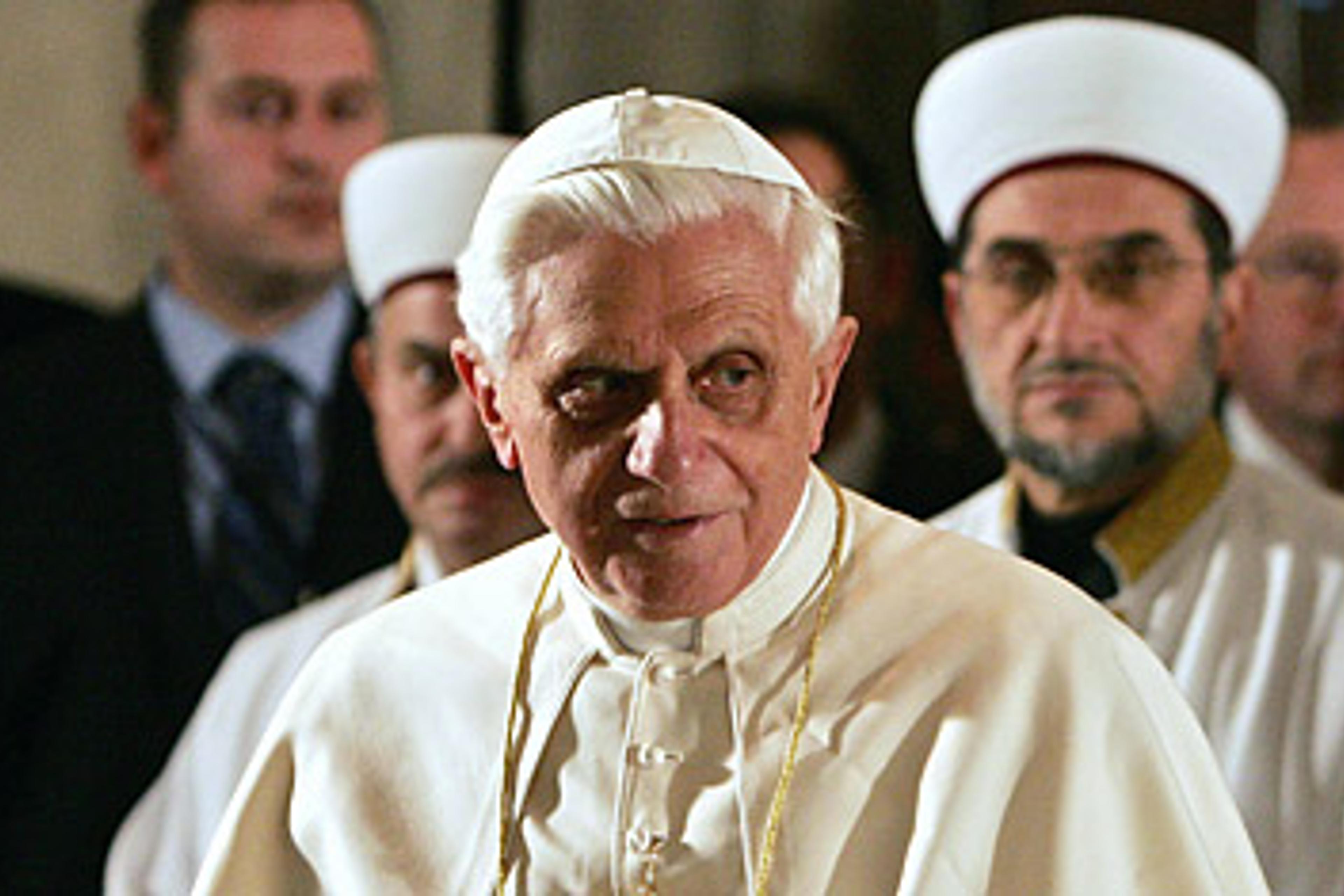 Pope Benedict XVI meditates as he visits the Blue Mosque in Istanbul on Nov. 30, 2006