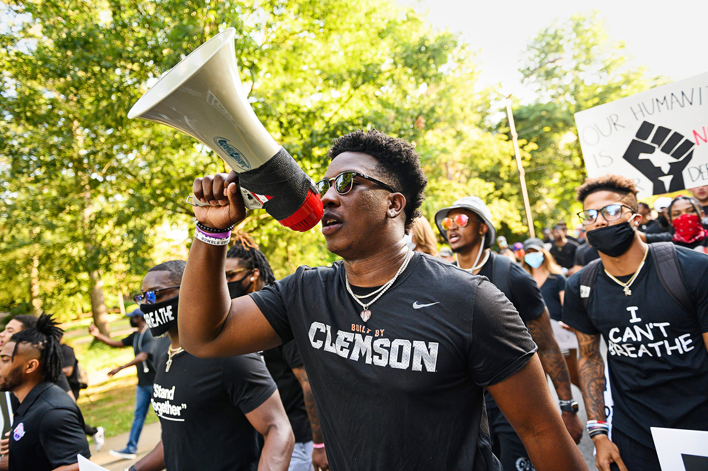Clemson football player K.J. Henry and teammates lead a Black Lives Matter rally
