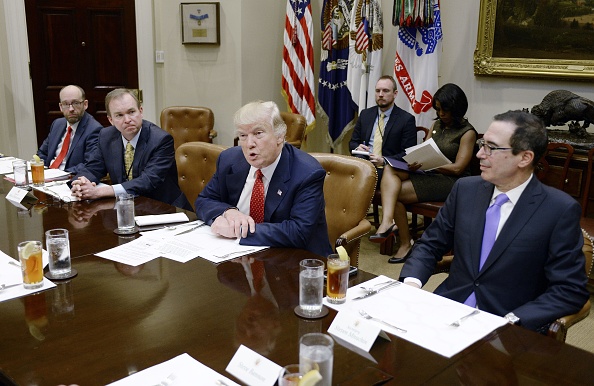 U.S. President Donald Trump discusses the federal budget as Treasury Secretary Steve Mnuchin (R) looks on in the Roosevelt Room of the White House on February 22, 2017 in Washington, DC.