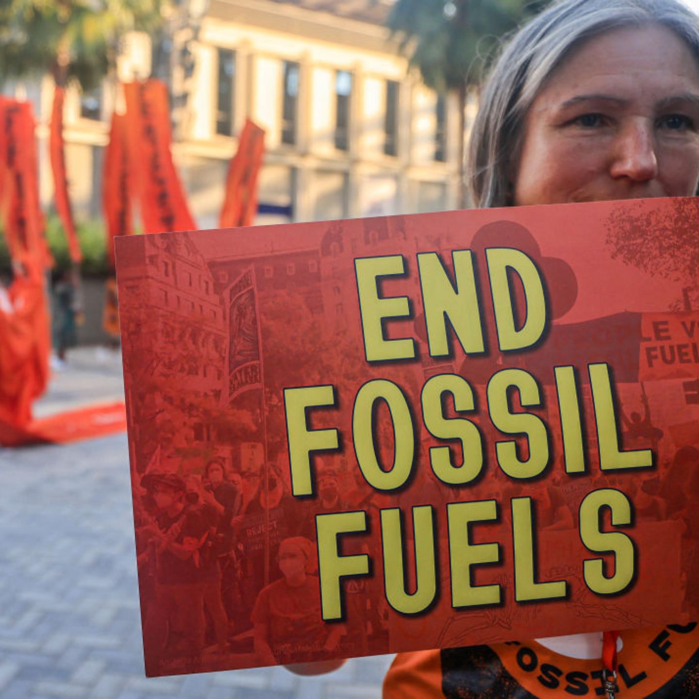Activists protest against fossil fuels on the sidelines of the COP28 United Nations climate summit in Dubai on Dec. 5, 2023.