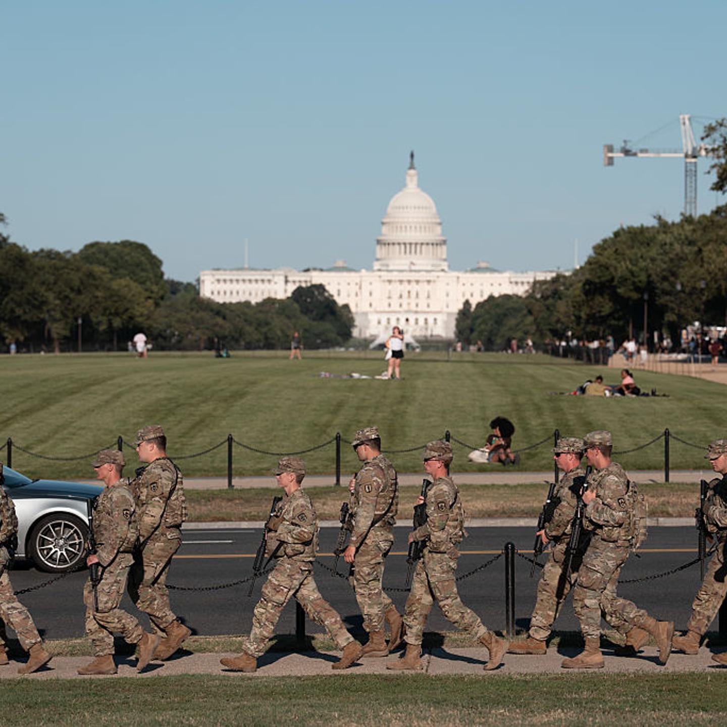 A National Guard unit patrols the National Mall