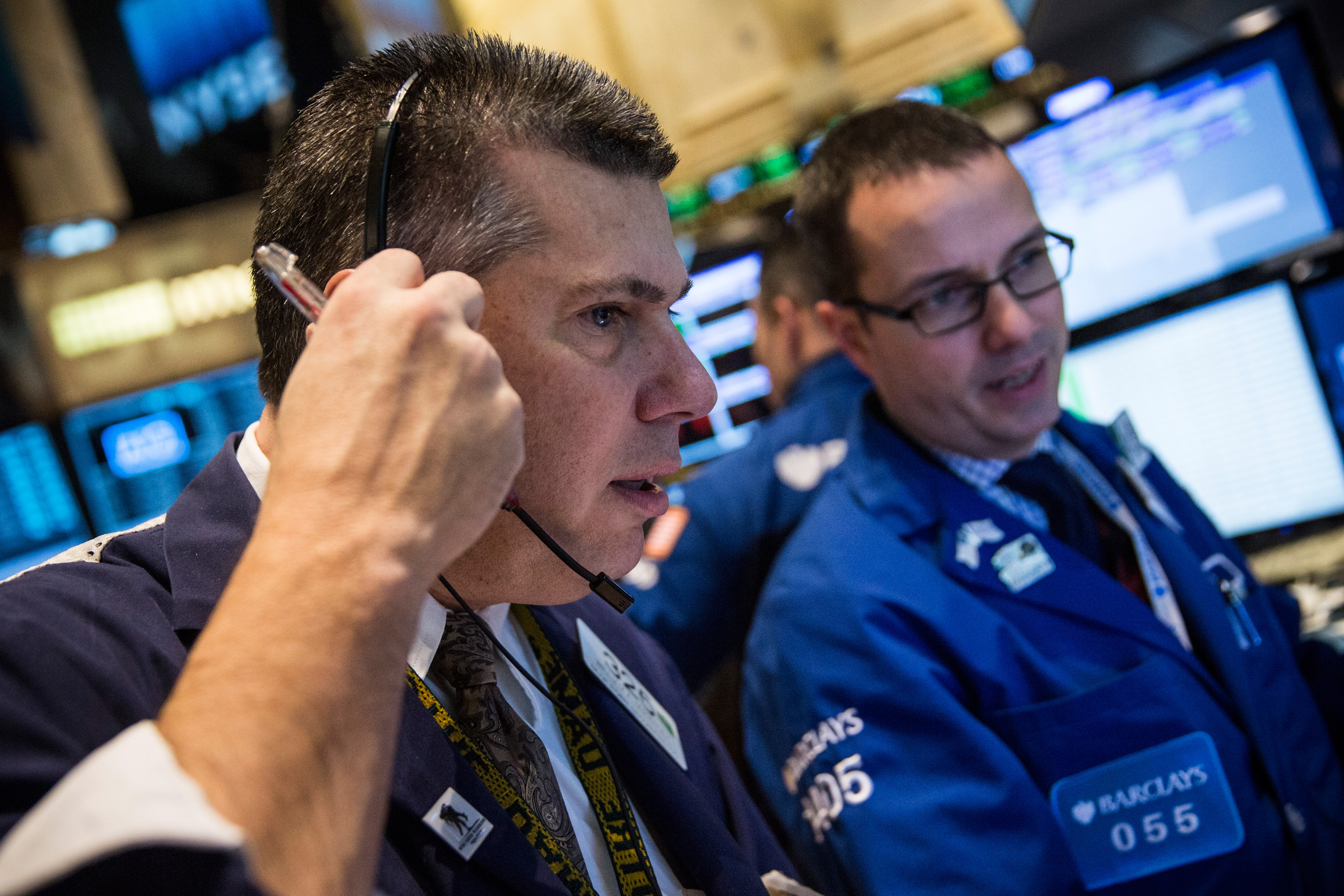 Traders work on the floor of the New York Stock Exchange.