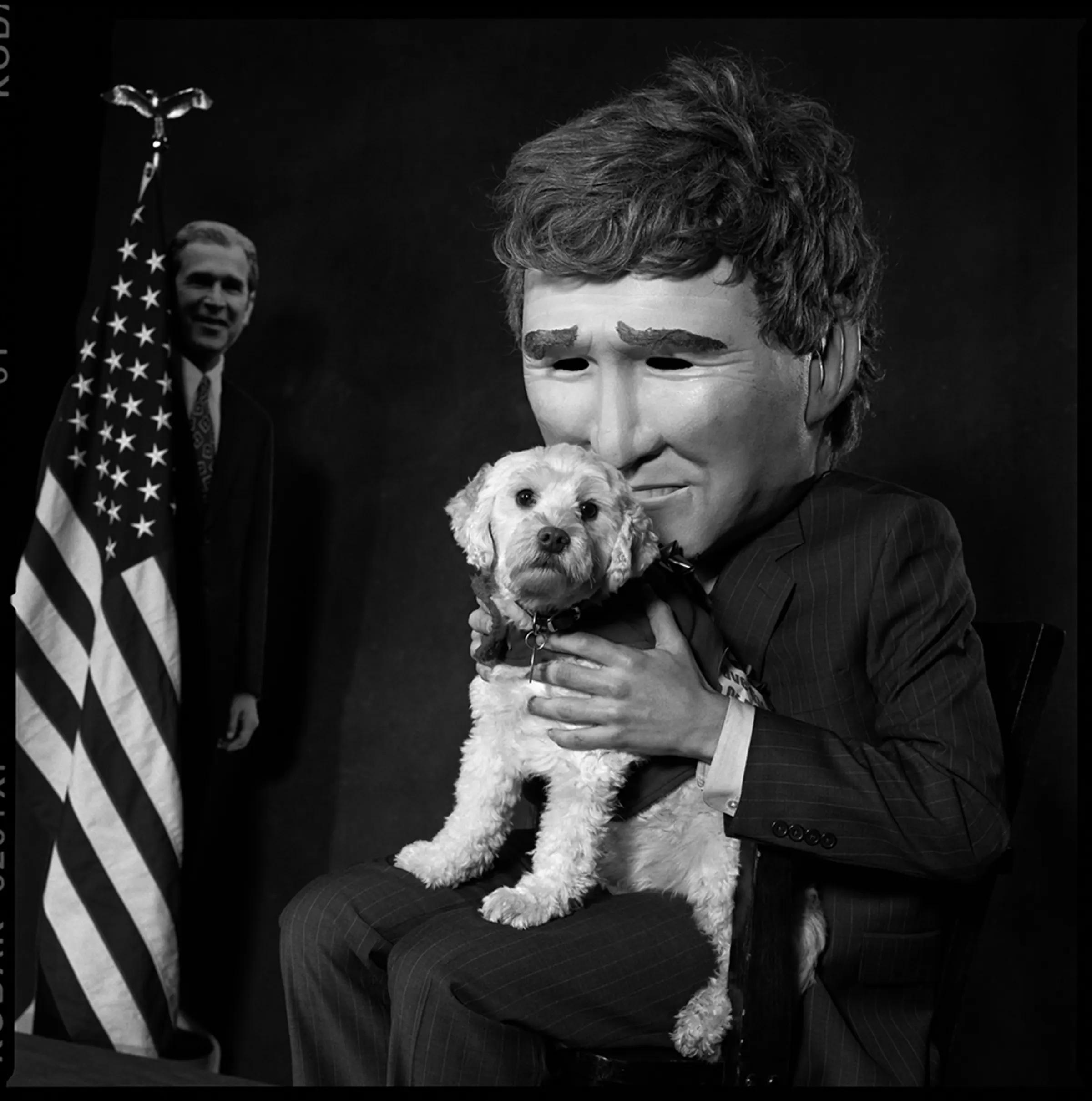 2007: PatriotismCody sits in the lap of a George W. Bush lookalike.