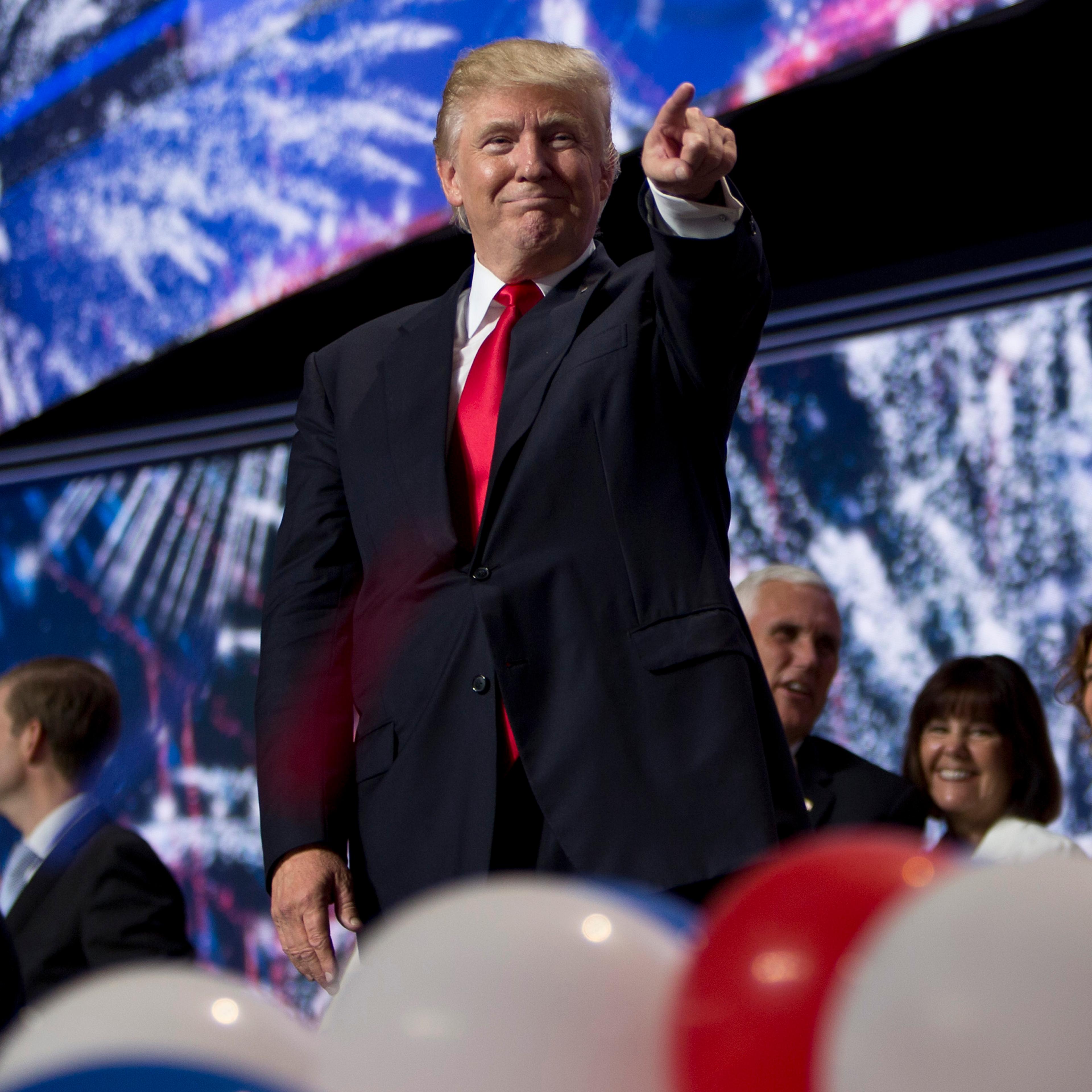 Republican presidential candidate Donald Trump points at the conclusion of the Republican National Convention on July 21, 2016 at the Quicken Loans Arena in Cleveland.