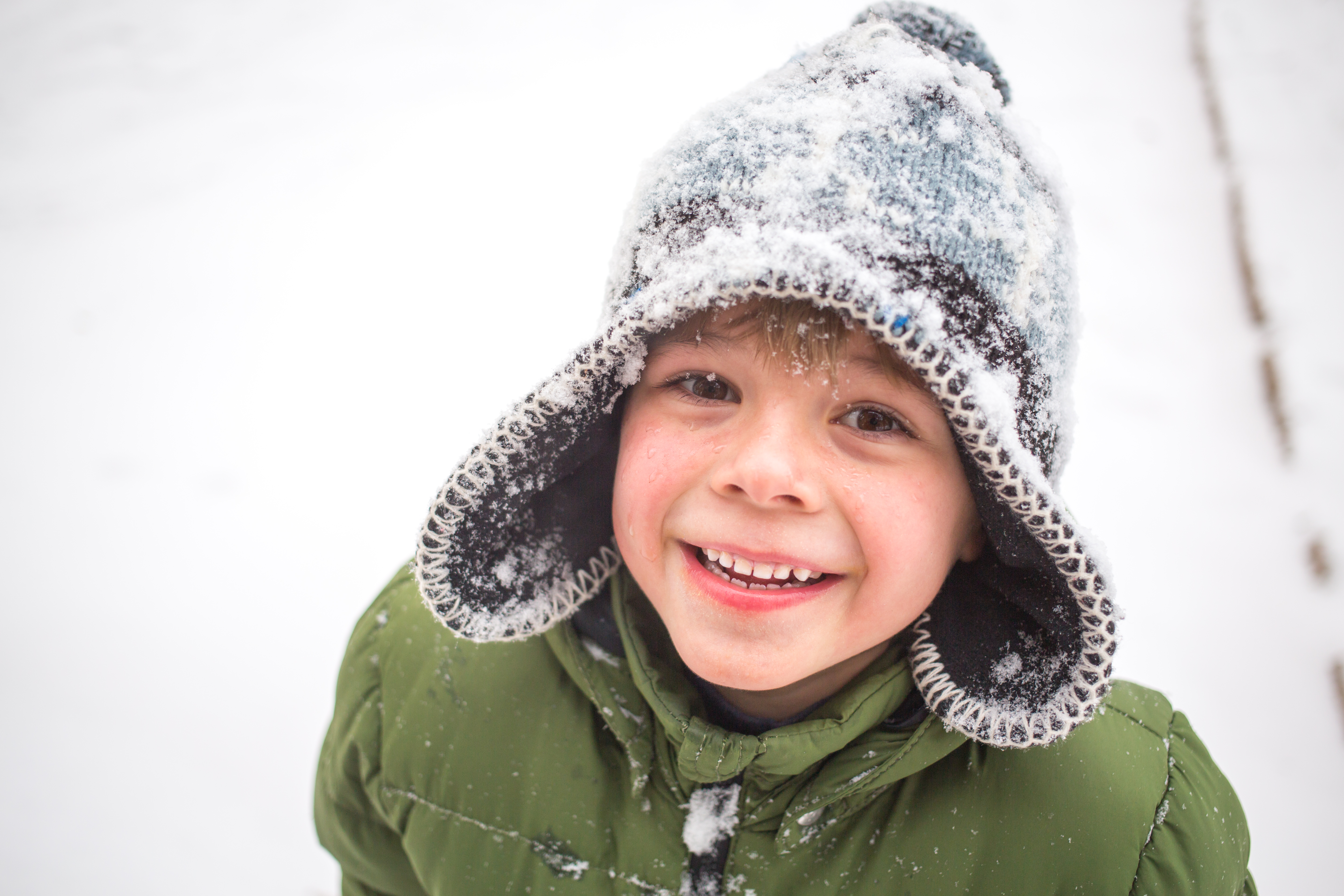 Boy winter playing