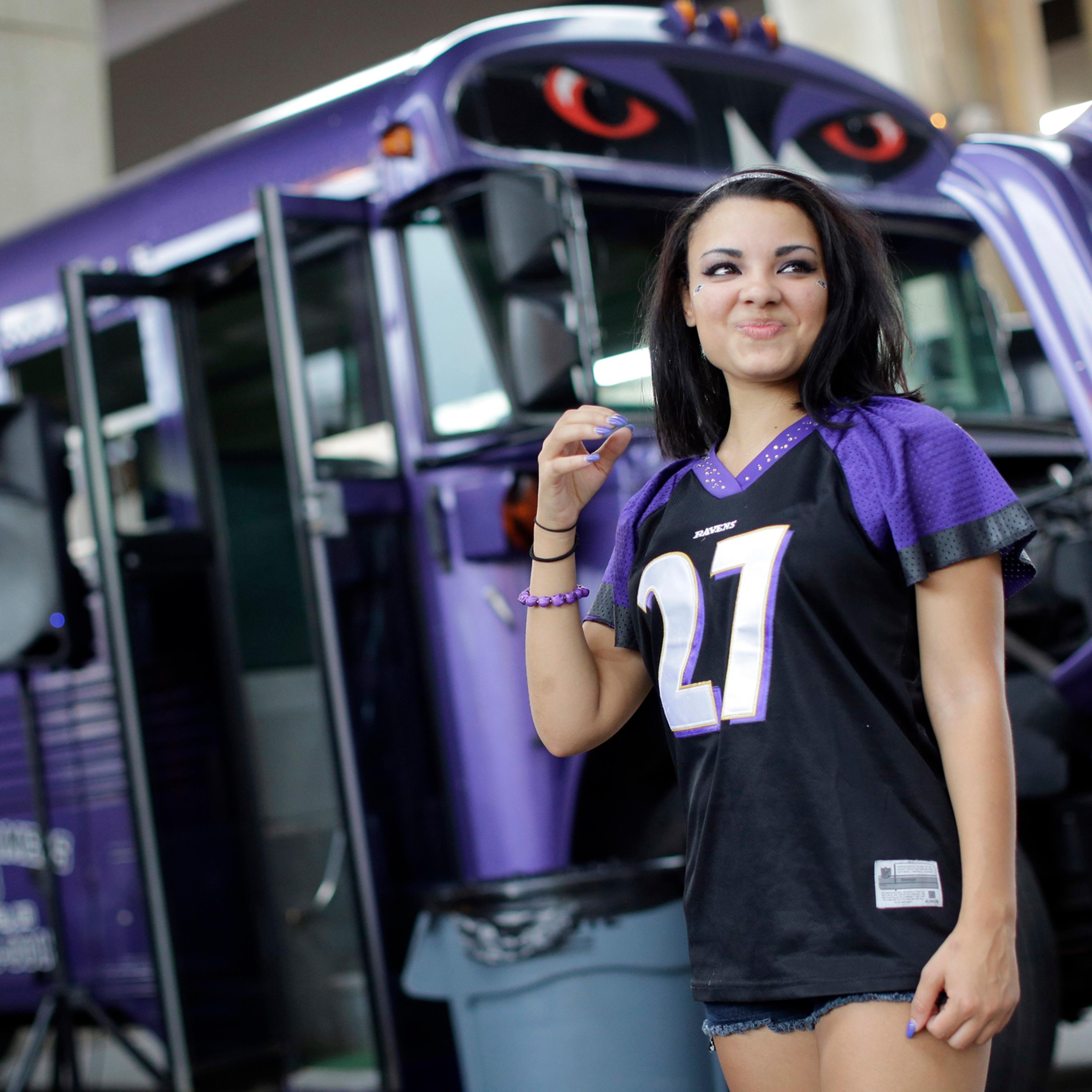 Racquel Bailey wears a Ray Rice jersey as she tailgates before the Baltimore Ravens' NFL football game against the Pittsburgh Steelers on Thursday, Sept. 11, 2014, in Baltimore.