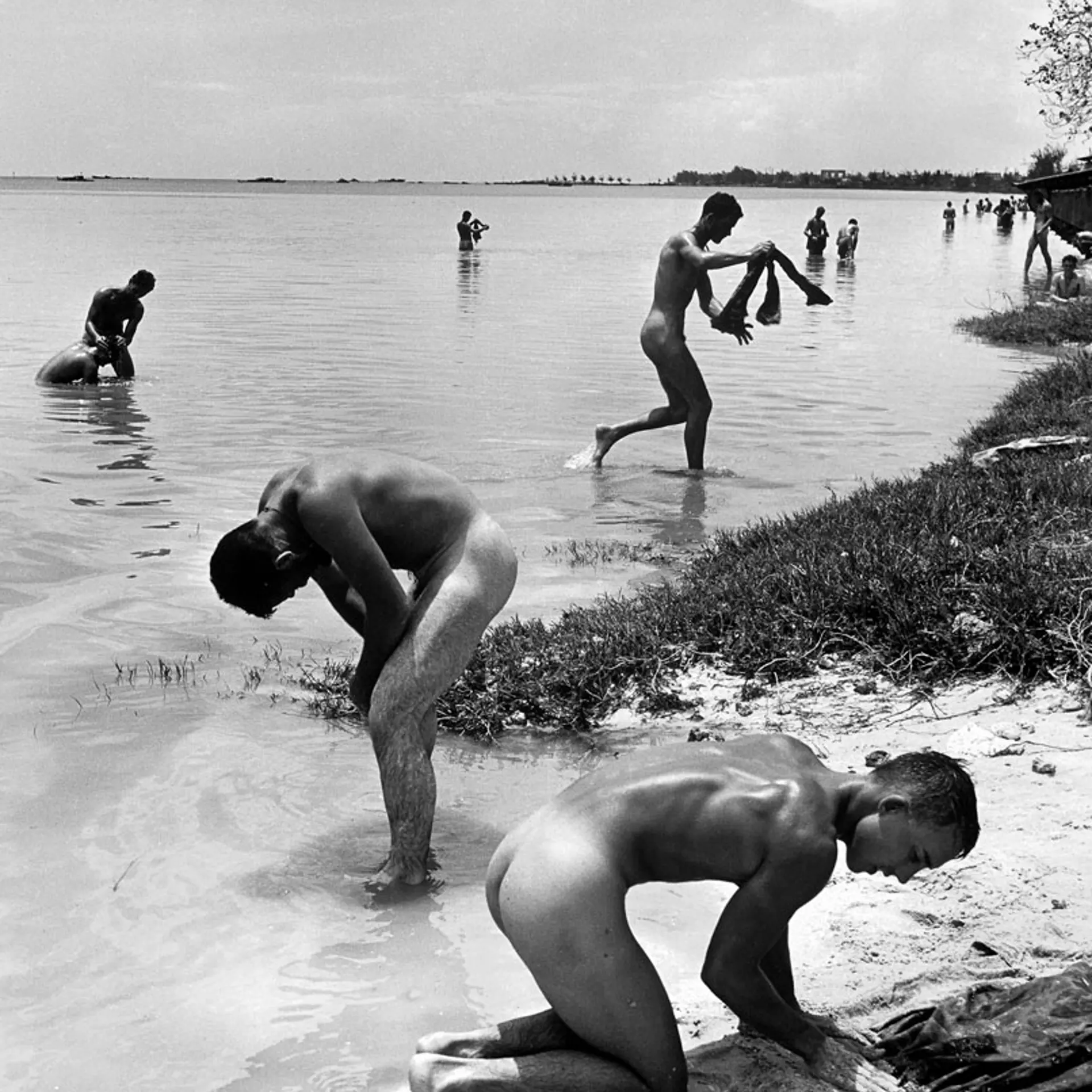 American troops in the Pacific bathe during a lull in the fighting on the island of Saipan, 1944.