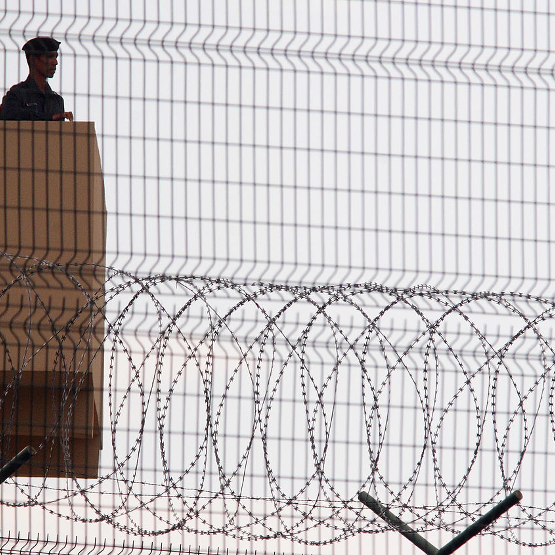 A guard keeps watch over Changi Prison on Nov. 24, 2005 in Singapore.
