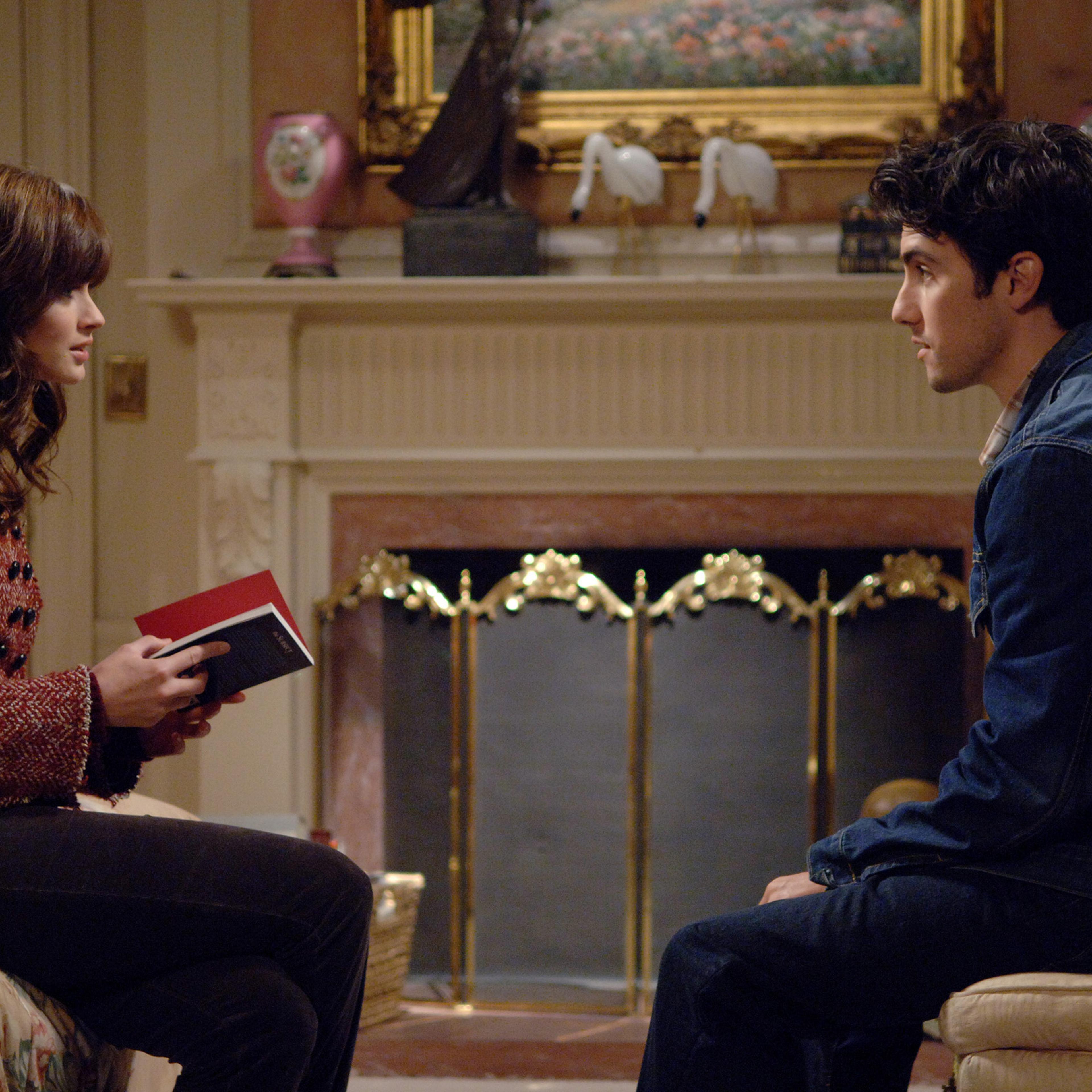 Milo Ventimiglia, who played the role of Jess on Gilmore Girls, sits with Alexis Bledel, who played Rory.