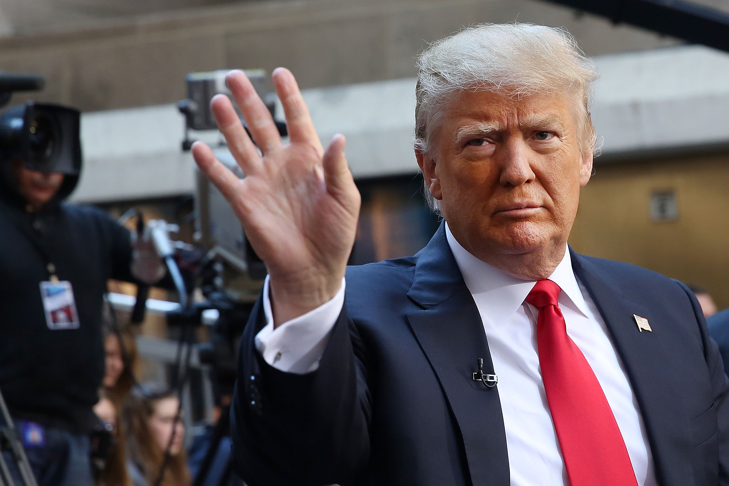Donald Trump waves to members of the audience while appearing at an NBC Town Hall at the Today Show in New York City on April 21, 2016.
