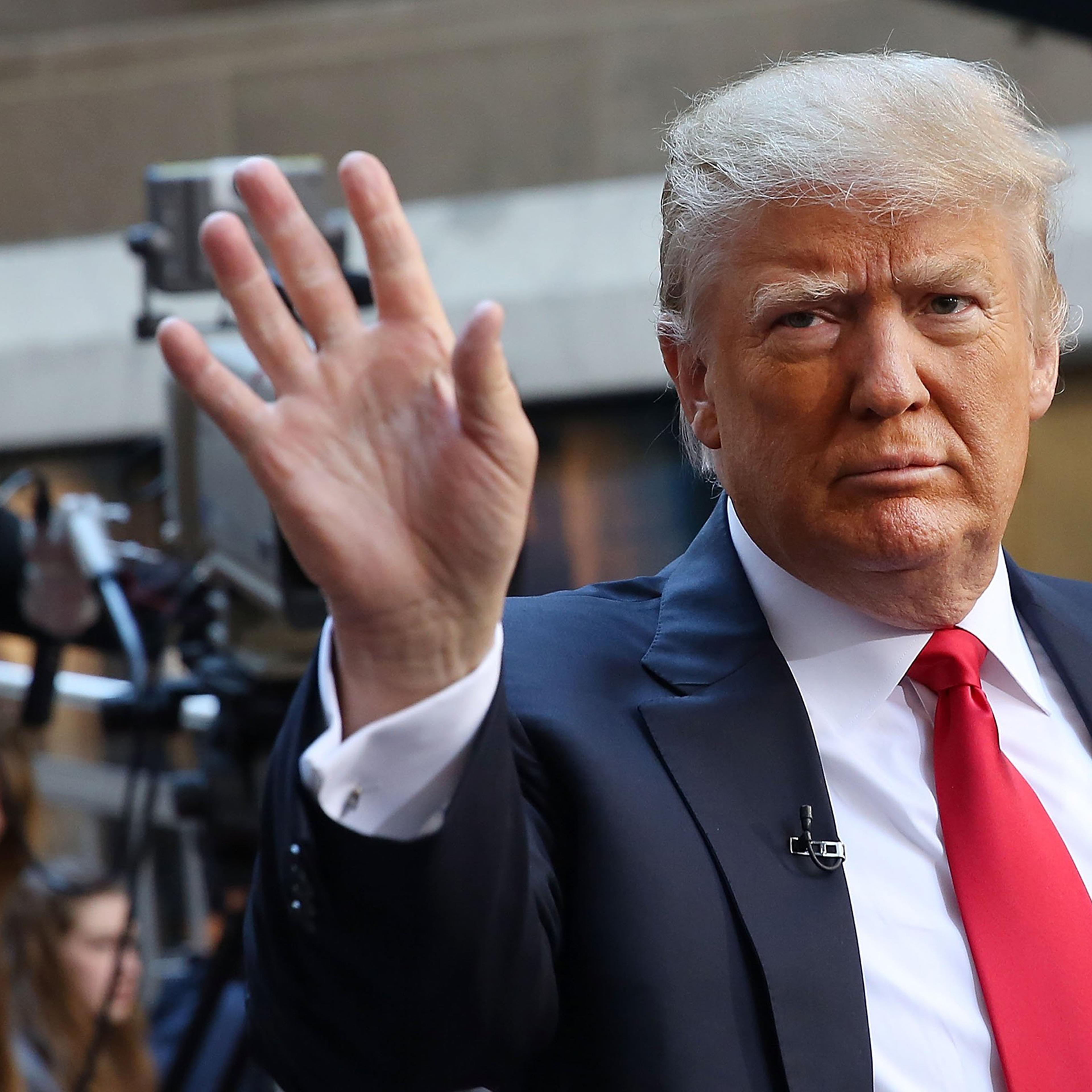 Donald Trump waves to members of the audience while appearing at an NBC Town Hall at the Today Show in New York City on April 21, 2016.