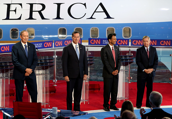 Republican presidential candidates former NY Governor George Pataki,former PA Senator Rick Santorum,LA Governor Bobby Jindal and SC Senator Lindsey Graham onstage during the Republican presidential debates at the Reagan Library in Simi Valley on Septembe