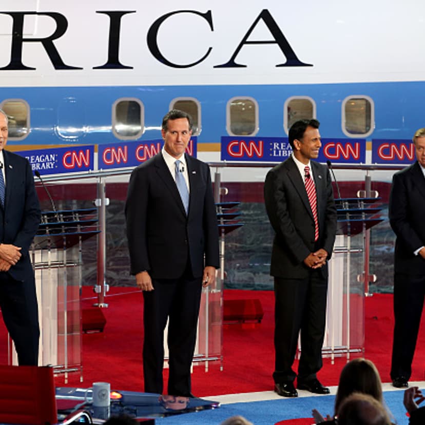 Republican presidential candidates former NY Governor George Pataki,former PA Senator Rick Santorum,LA Governor Bobby Jindal and SC Senator Lindsey Graham onstage during the Republican presidential debates at the Reagan Library in Simi Valley on Septembe
