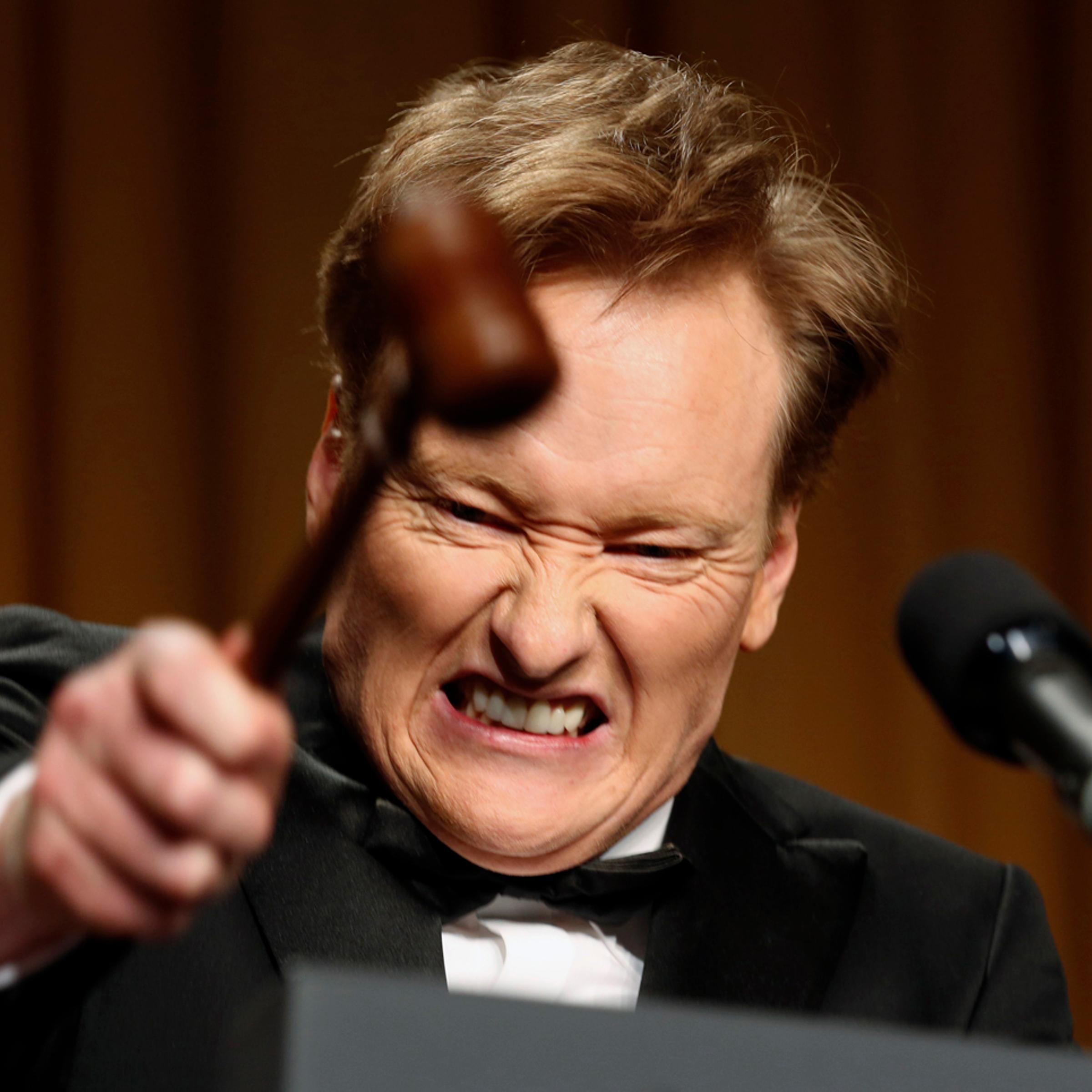 Comedian O'Brien smashes a gavel as he speaks during the White House Correspondents Association Dinner in Washington