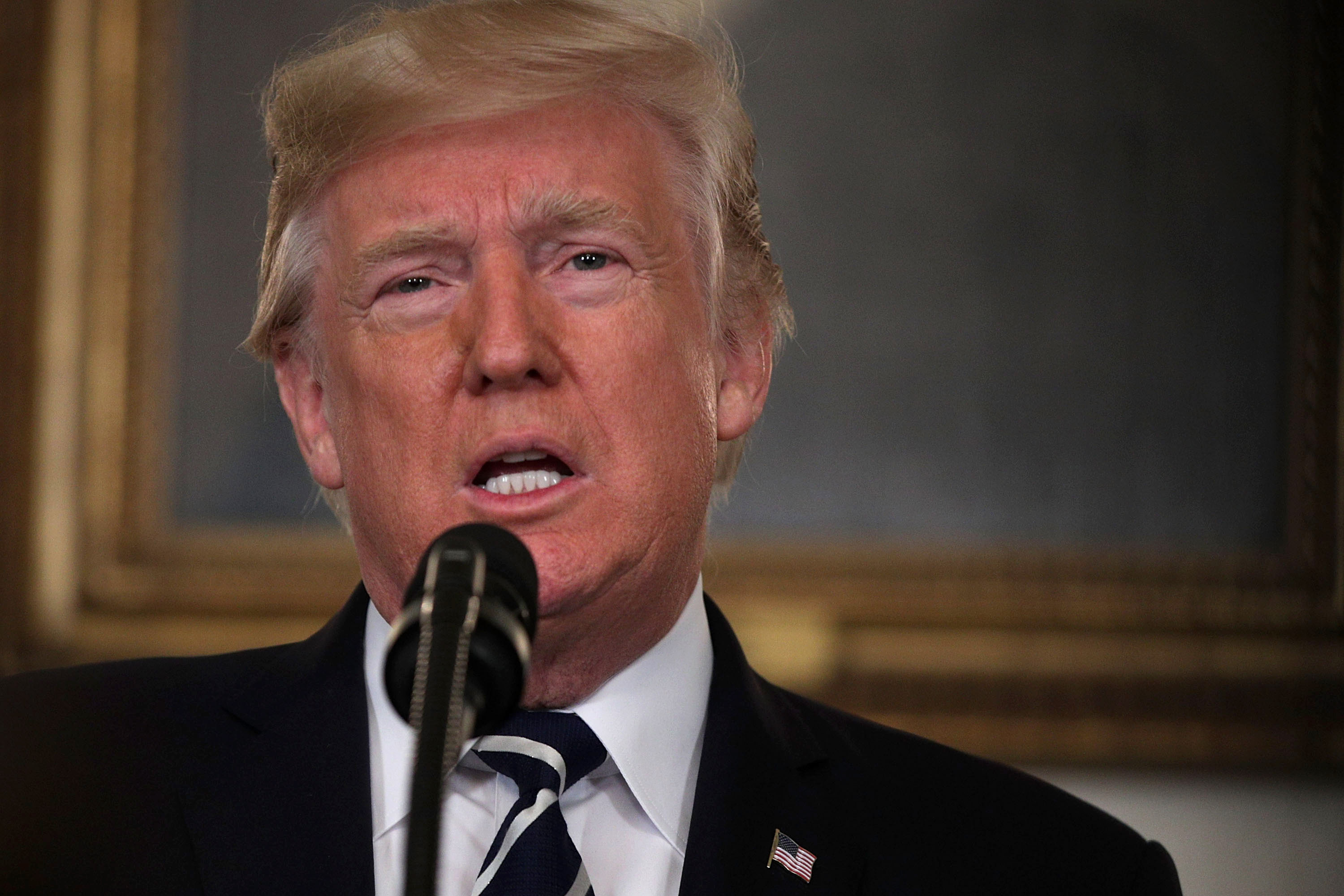 U.S. President Donald Trump makes a statement on the Las Vegas mass shooting at the Diplomatic Room of the White House October 2, 2017 in Washington, DC.