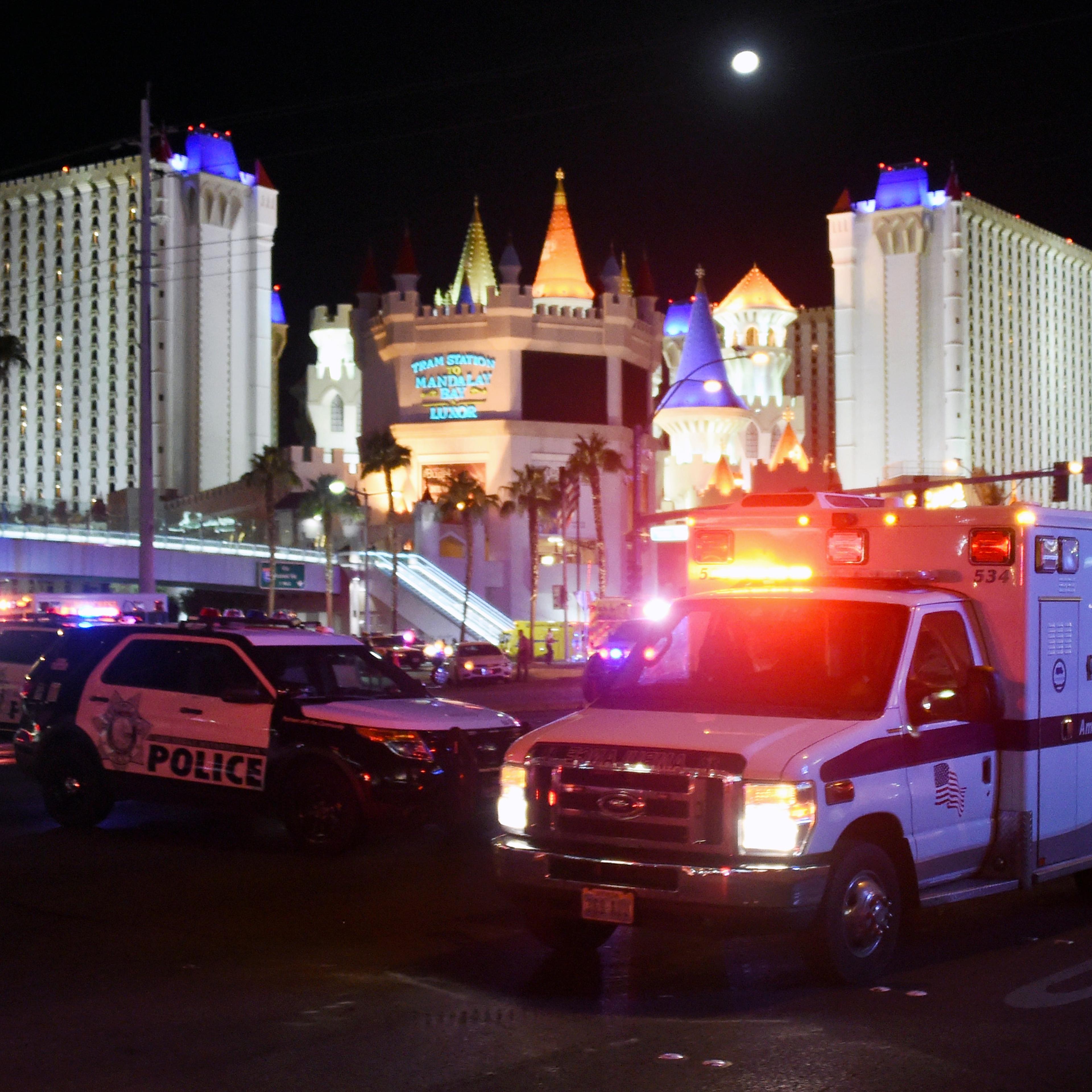 An ambulance leaves the intersection of Las Vegas Boulevard and Tropicana Ave. after a mass shooting at a country music festival nearby on October 2, 2017 in Las Vegas, Nevada.