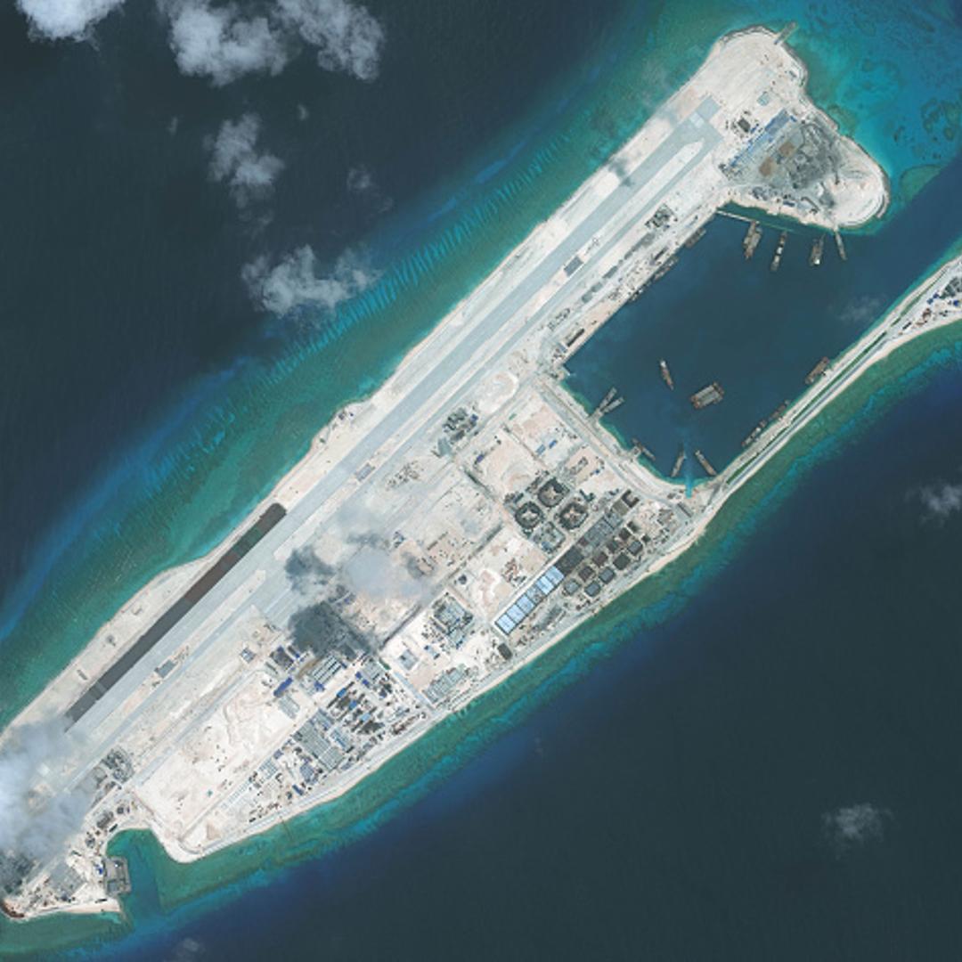 FIERY CROSS REEF, SOUTH CHINA SEA - SEPTEMBER 3, 2015: DigitalGlobe imagery of the nearly completed construction within the Fiery Cross Reef located in the South China Sea. Fiery Cross is located in the western part of the Spratly Islands group. Photo