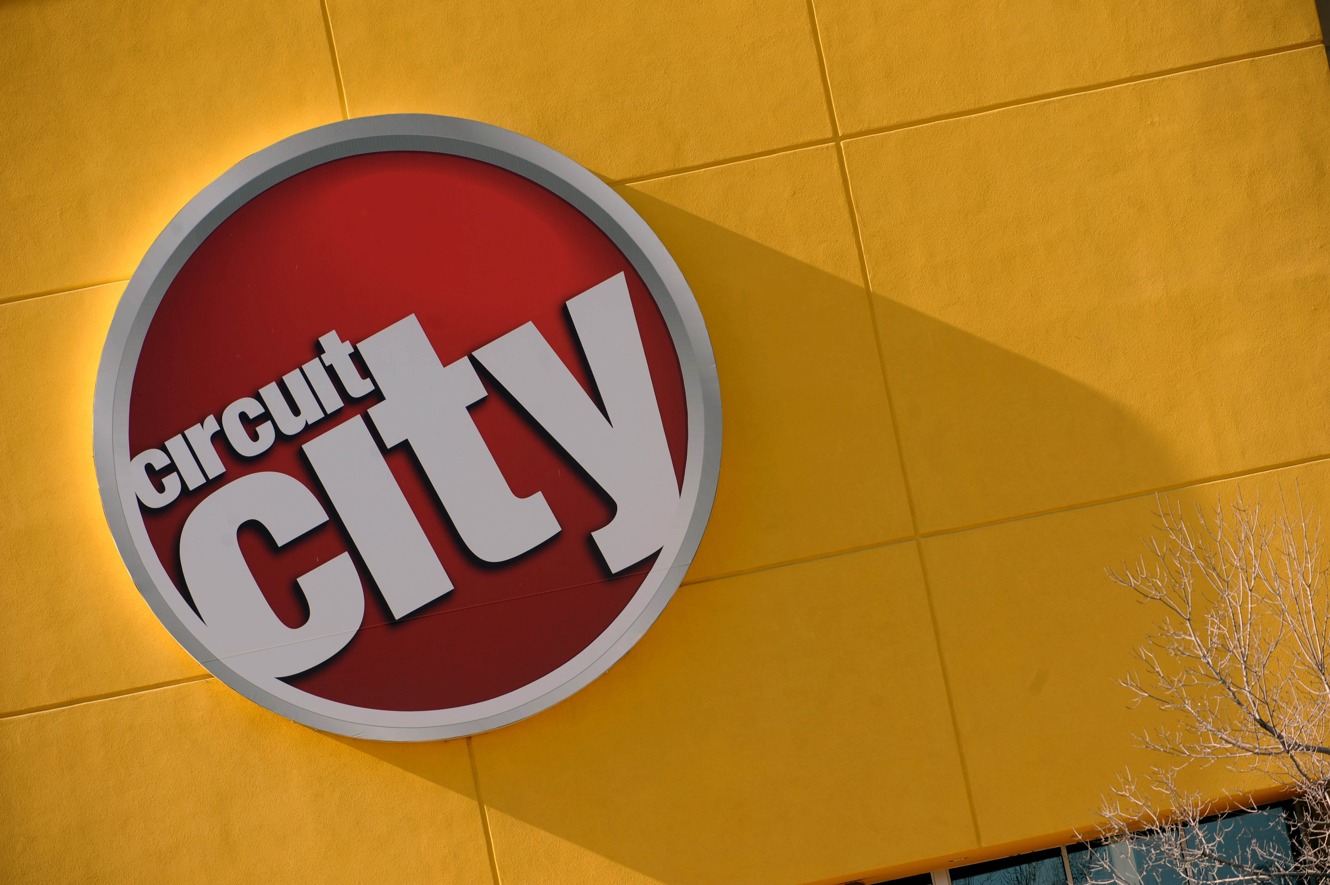 A Circuit City sign hangs outside a store in Denver.