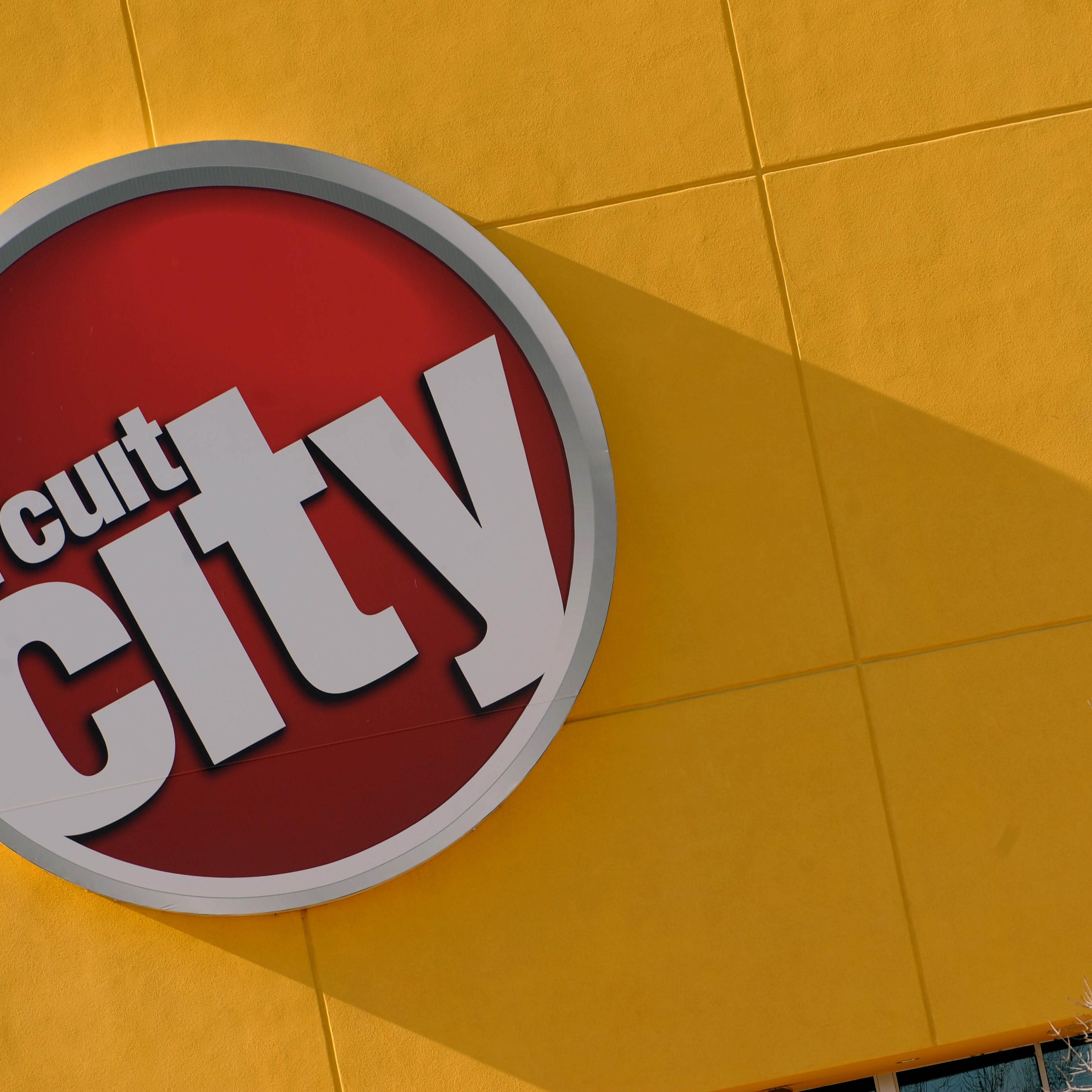 A Circuit City sign hangs outside a store in Denver.