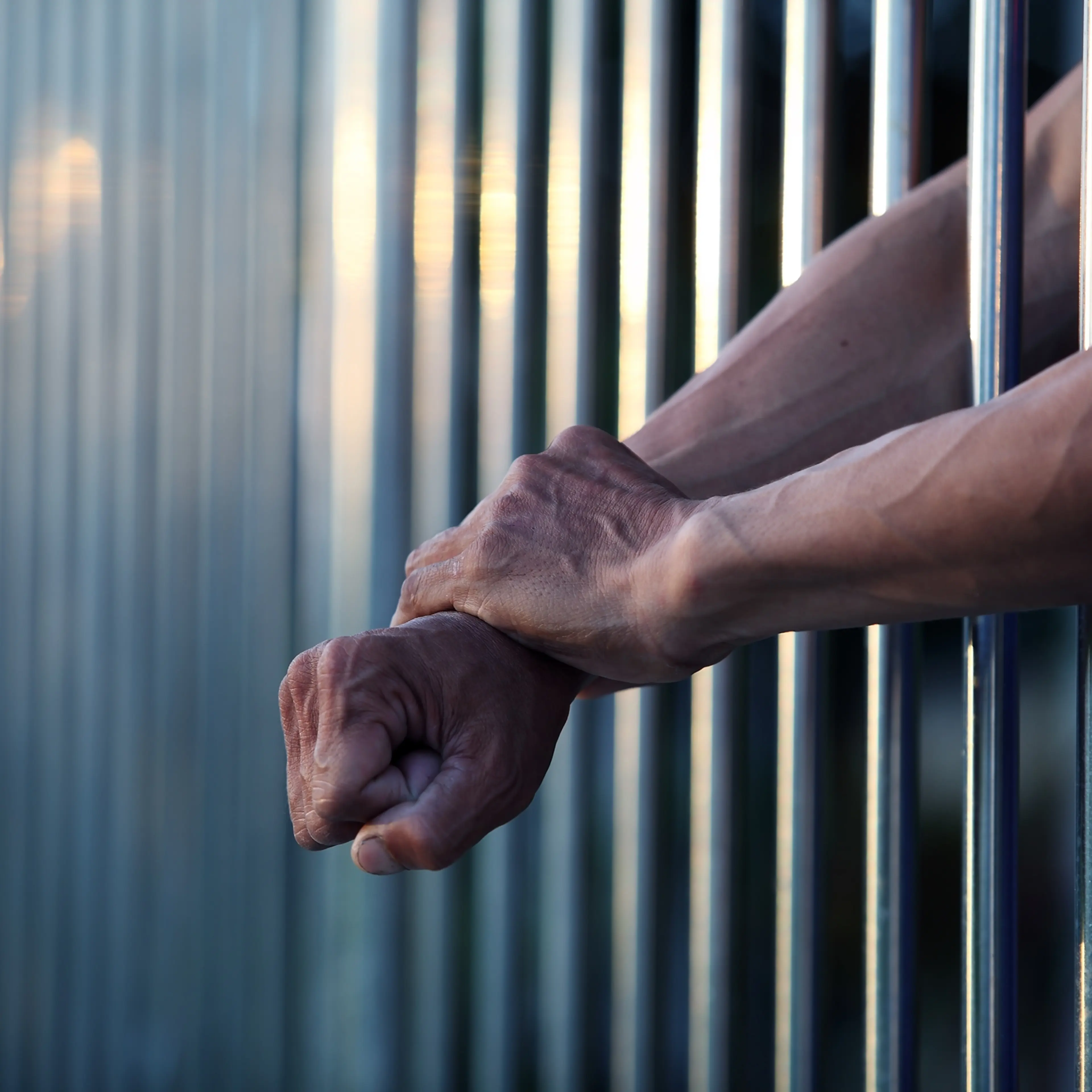 hand in jail