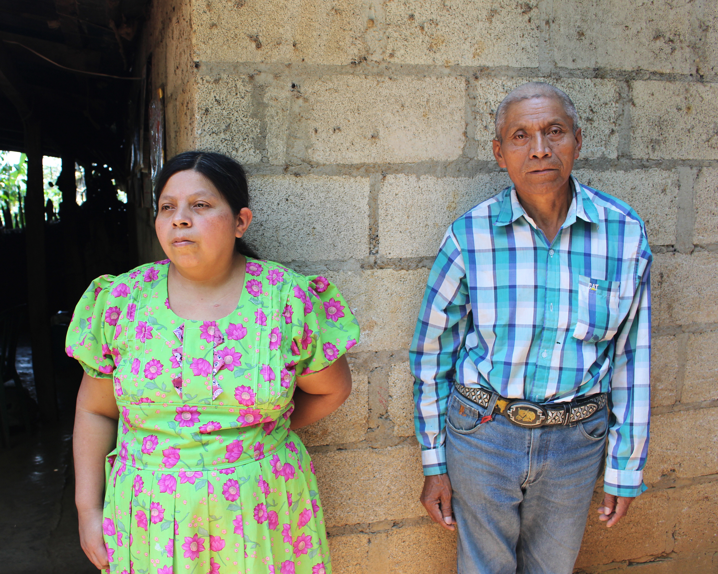 Juan de León Gutiérrez's parents, Tránsito Gutiérrez and Tanerjo de Léon, outside their home in El Tesoro, Guatemala.