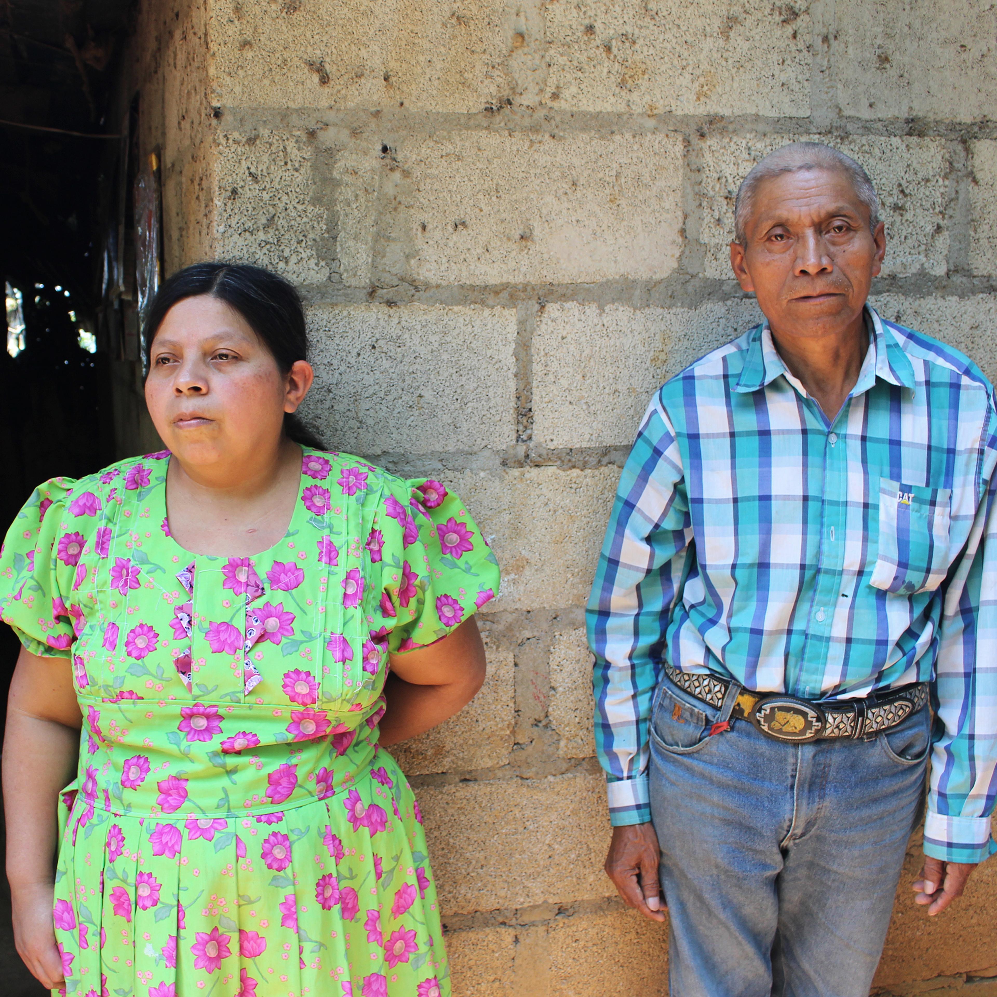 Juan de León Gutiérrez's parents, Tránsito Gutiérrez and Tanerjo de Léon, outside their home in El Tesoro, Guatemala.