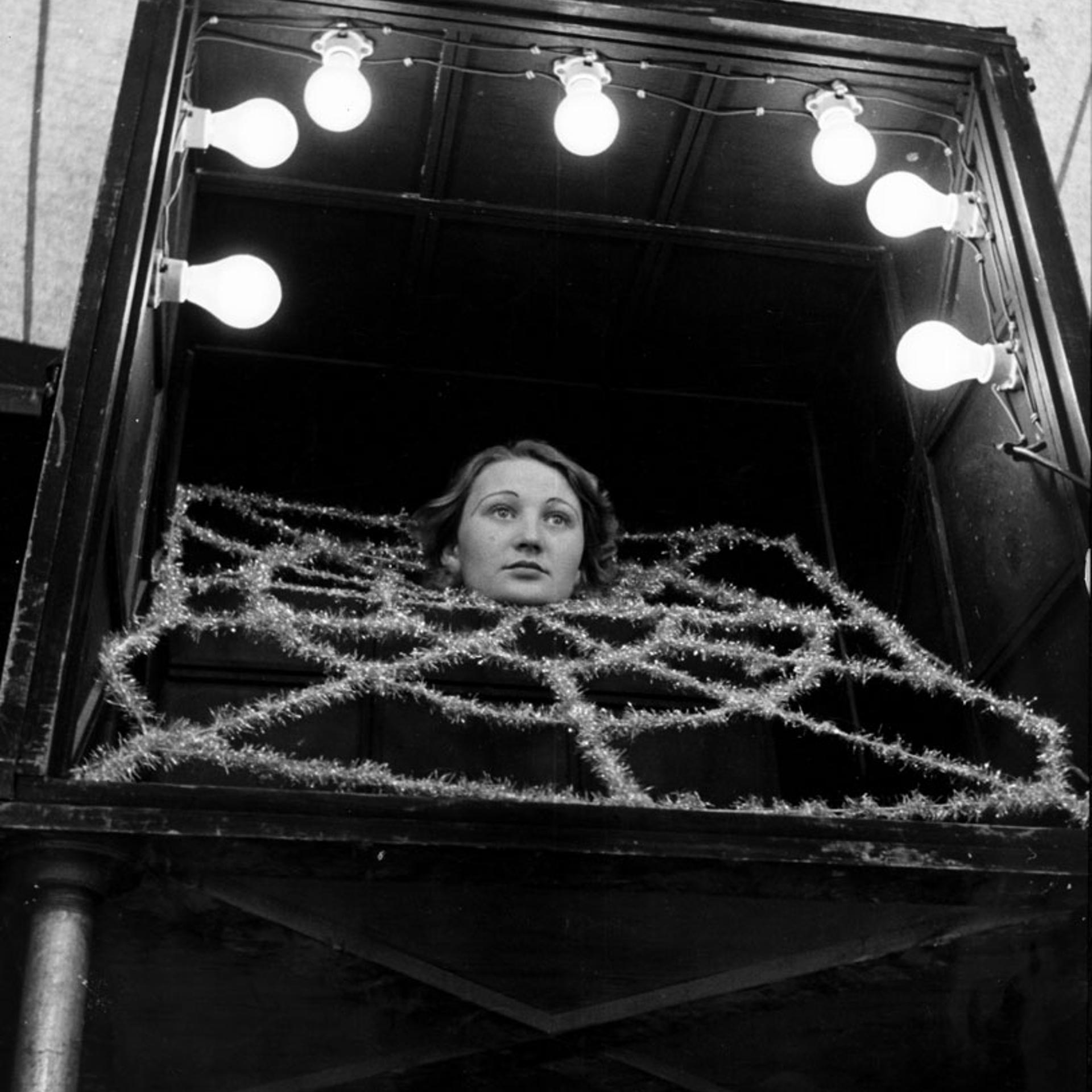 <b>Caption from LIFE.</b> "Girl without body."