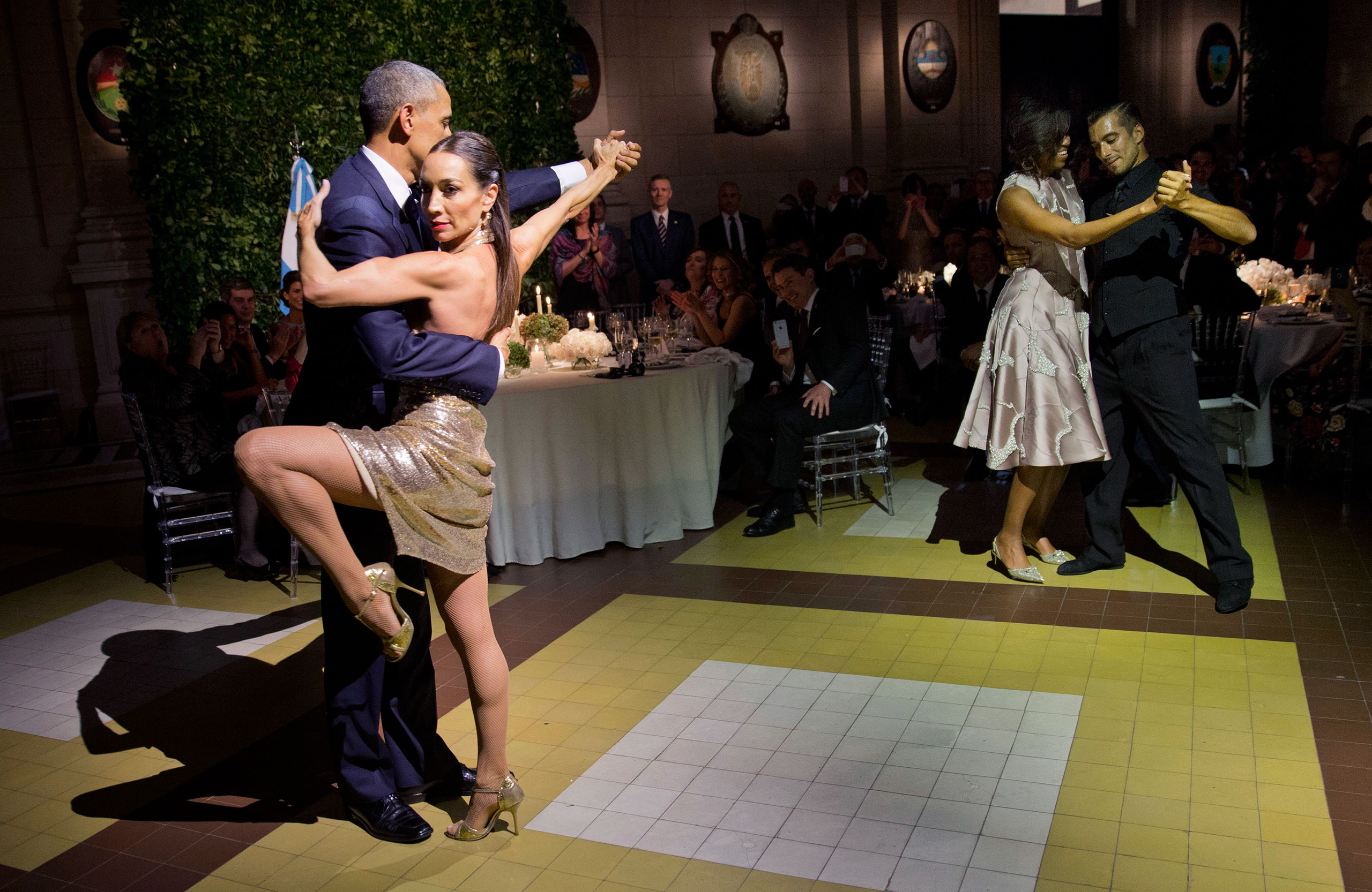 President Barack Obama and First Lady Michelle Obama perform the tango with dance partners the State Dinner at the Centro Cultural Kirchner in Buenos Aires, Argentina, March 23, 2016.
