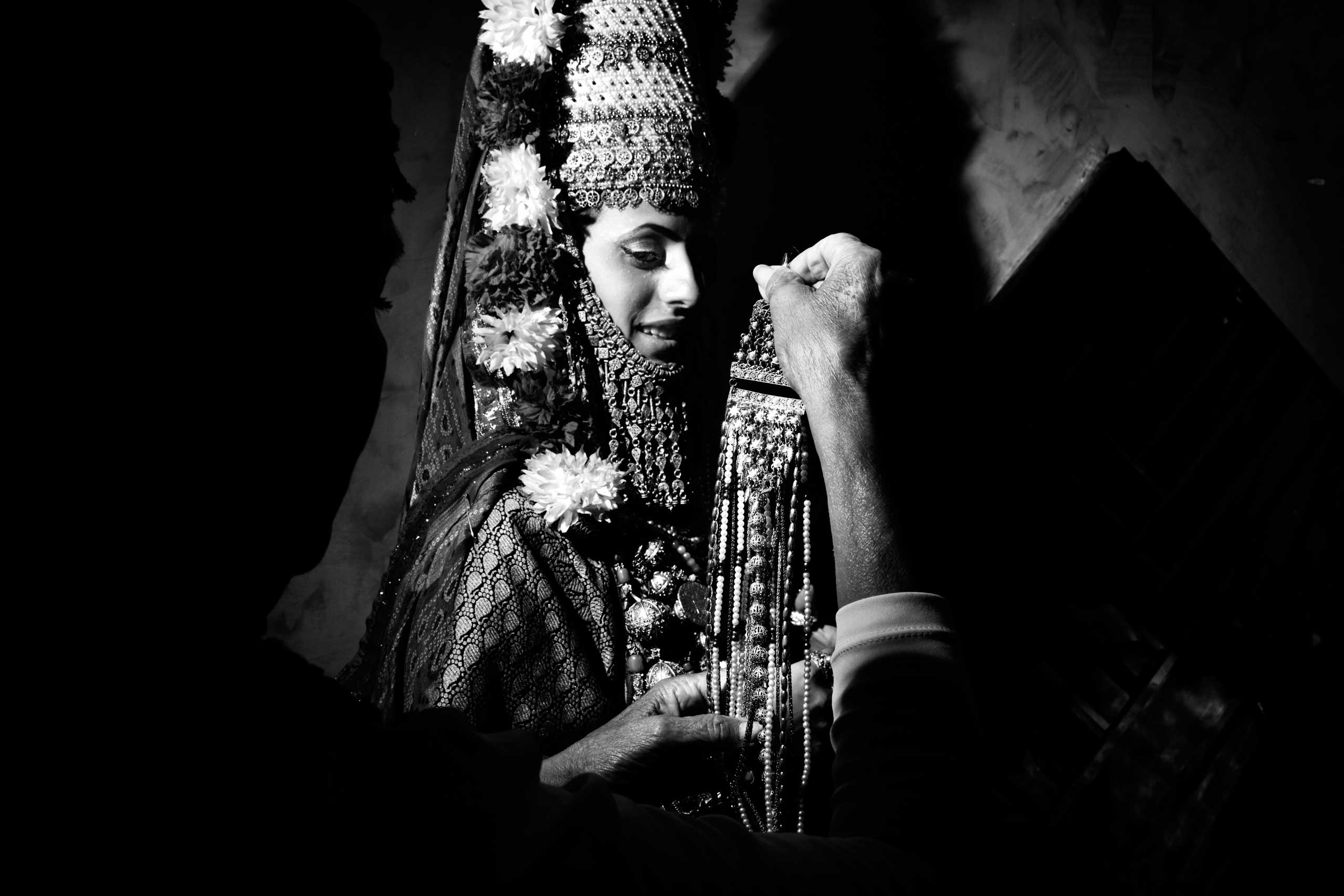 The henna is a pre-nuptial cerimony celebrated in Moroccan or Yemenite families where the soon-to-be bride is dressed-up as a Queen with flowers and jewels and she is inivited to dance with her girl friends to say good-bye to celibacy and life as a singl
