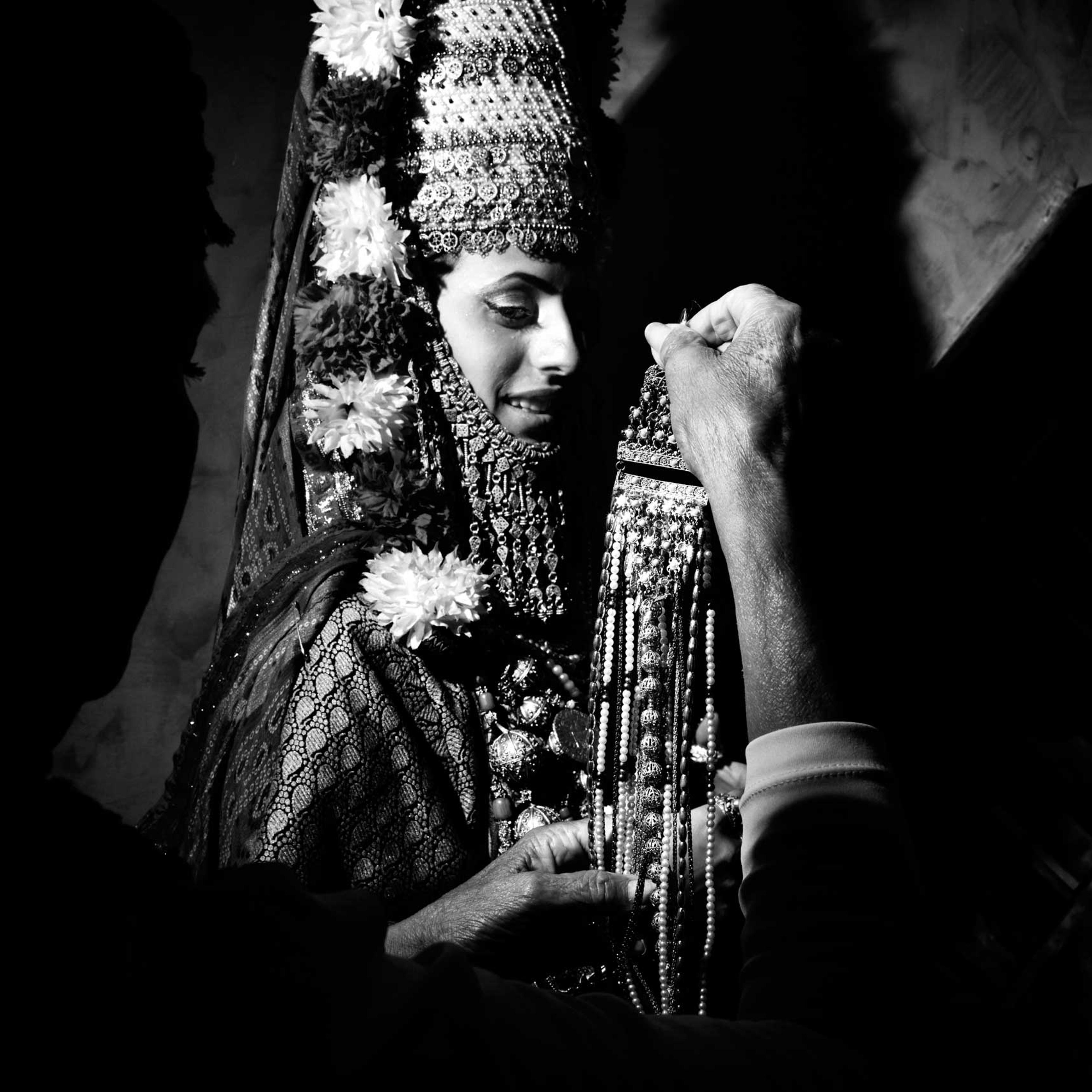 The henna is a pre-nuptial cerimony celebrated in Moroccan or Yemenite families where the soon-to-be bride is dressed-up as a Queen with flowers and jewels and she is inivited to dance with her girl friends to say good-bye to celibacy and life as a singl