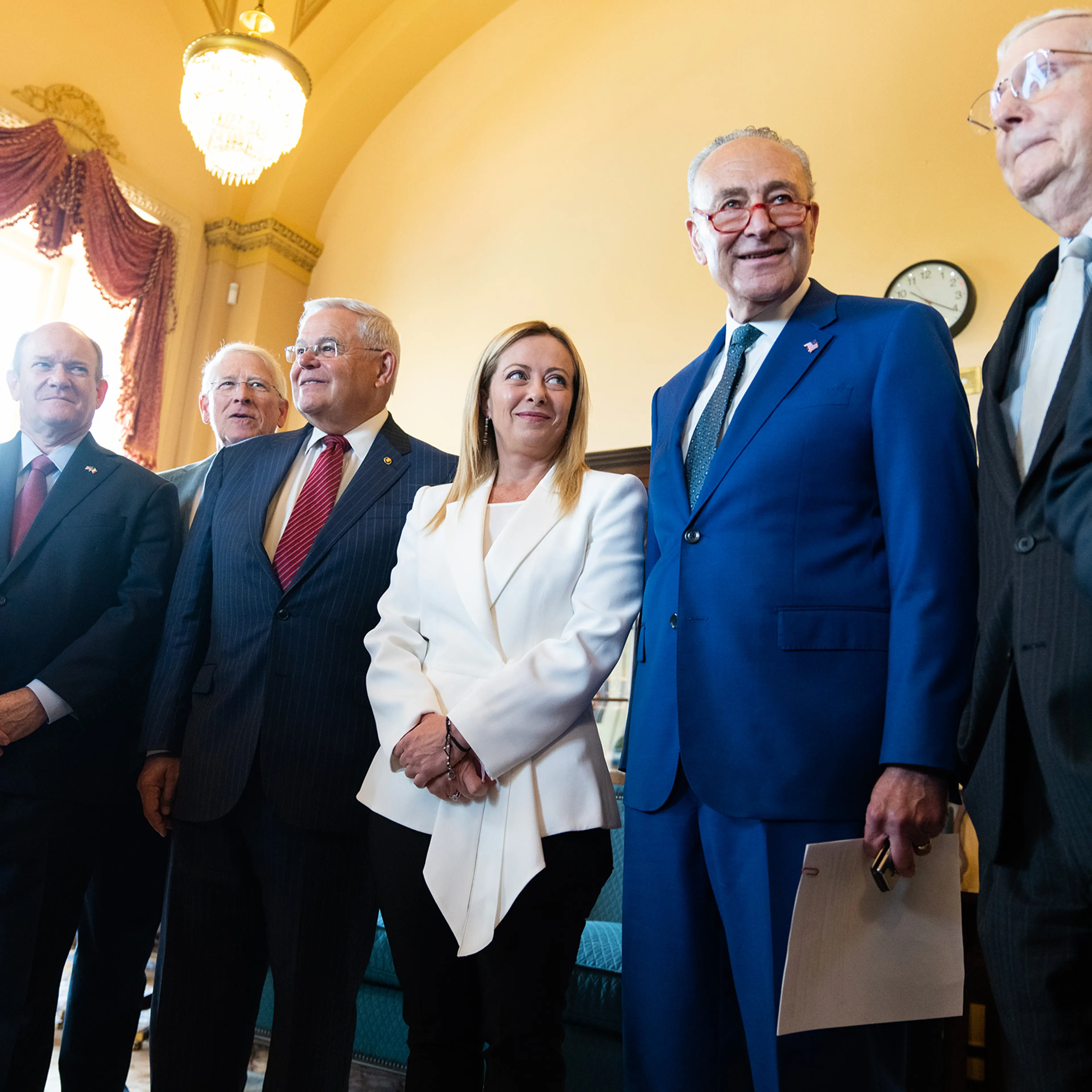 Italian Prime Minister Giorgia Meloni poses with senators before a bipartisan meeting in the U.S. Capitol on July 27. From left are, Sens. Ben Cardin, D-Md., Chris Coons, D-Del., Roger Wicker, R-Miss., Bob Menendez, D-N.J., Meloni, Senate Majority Leader Charles Schumer, D-N.Y., and Senate Minority Leader Mitch McConnell, R-Ky.