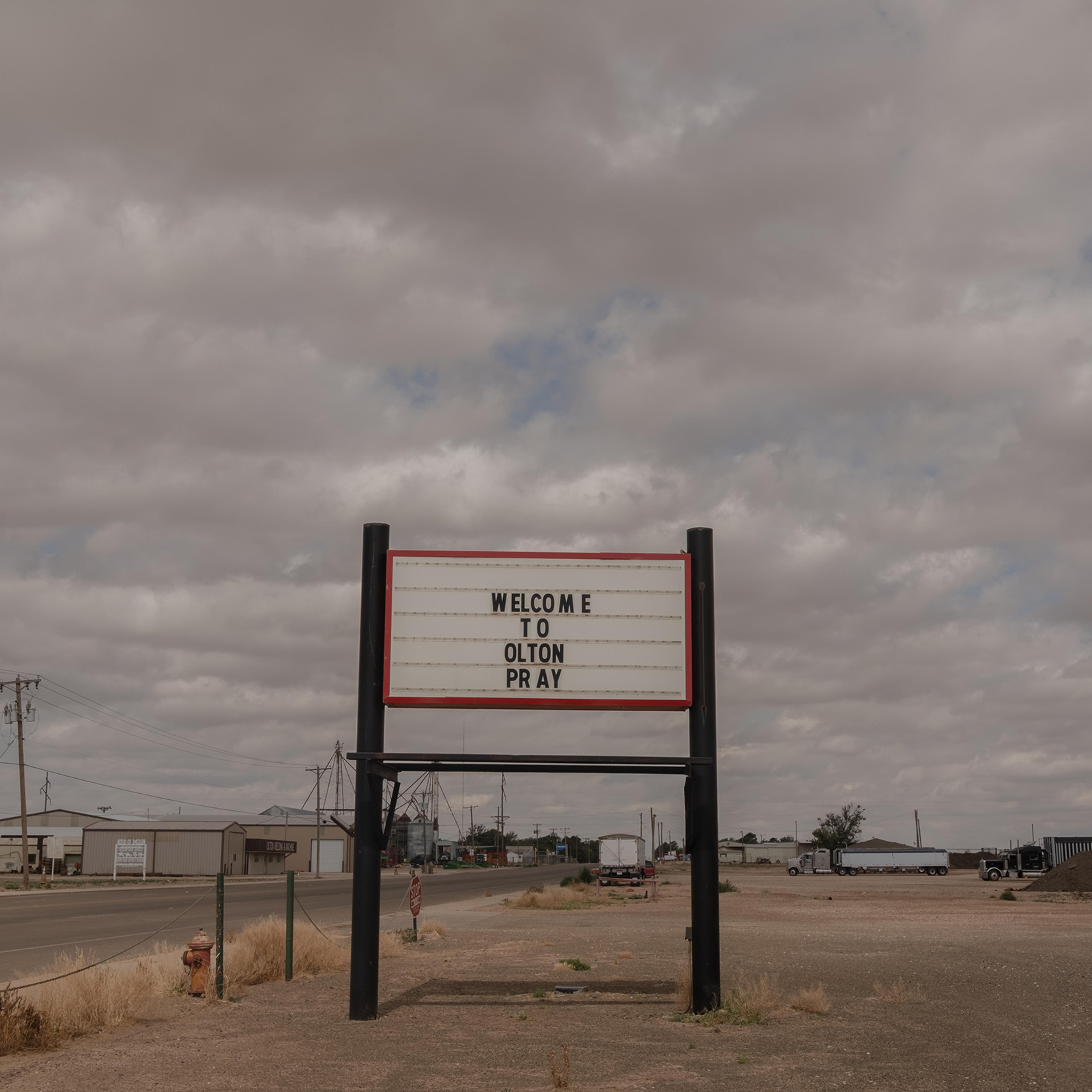A welcoming sign at Olton urges residents to pray, in Lamb County Texas on June 26, 2022.