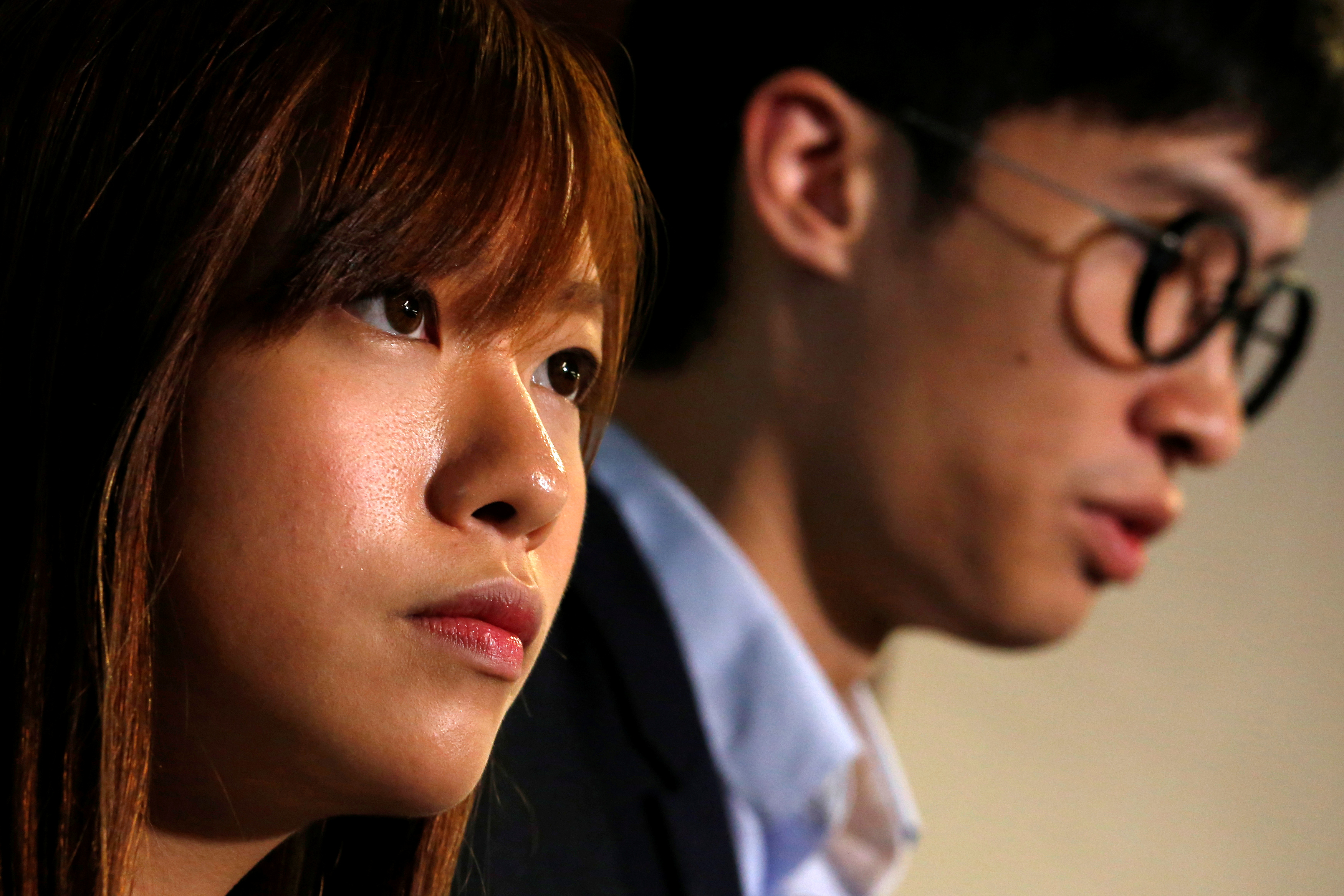 Pro-independence legislator elects Yau Wai-ching and Baggio Leung react inside Legislative Council in Hong Kong