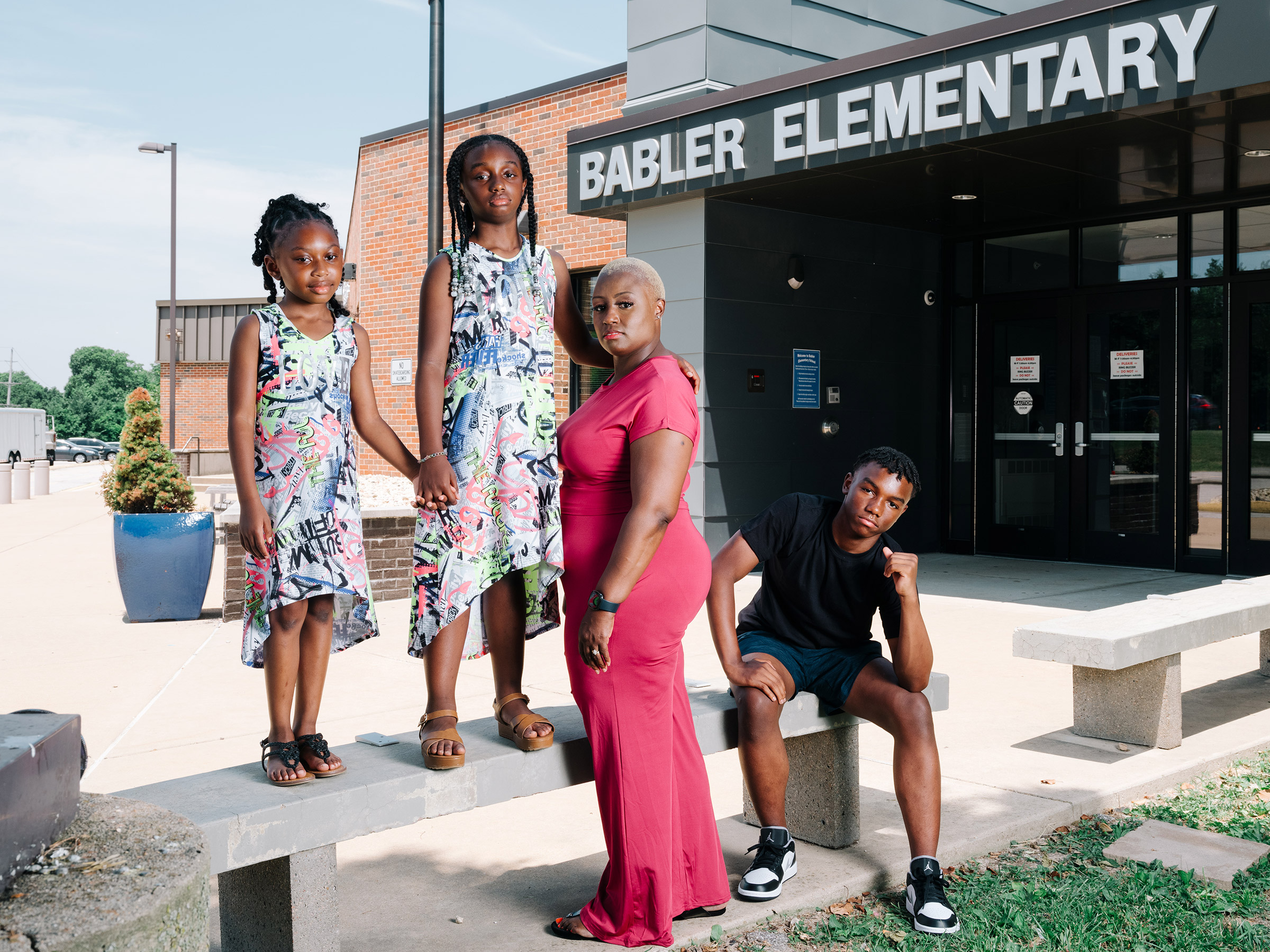 "If we can’t have these hard conversations, how can we possibly expect our children to?" Shemia Reese with her family at Babler Elementary in Glencoe, Mo., on June 18.