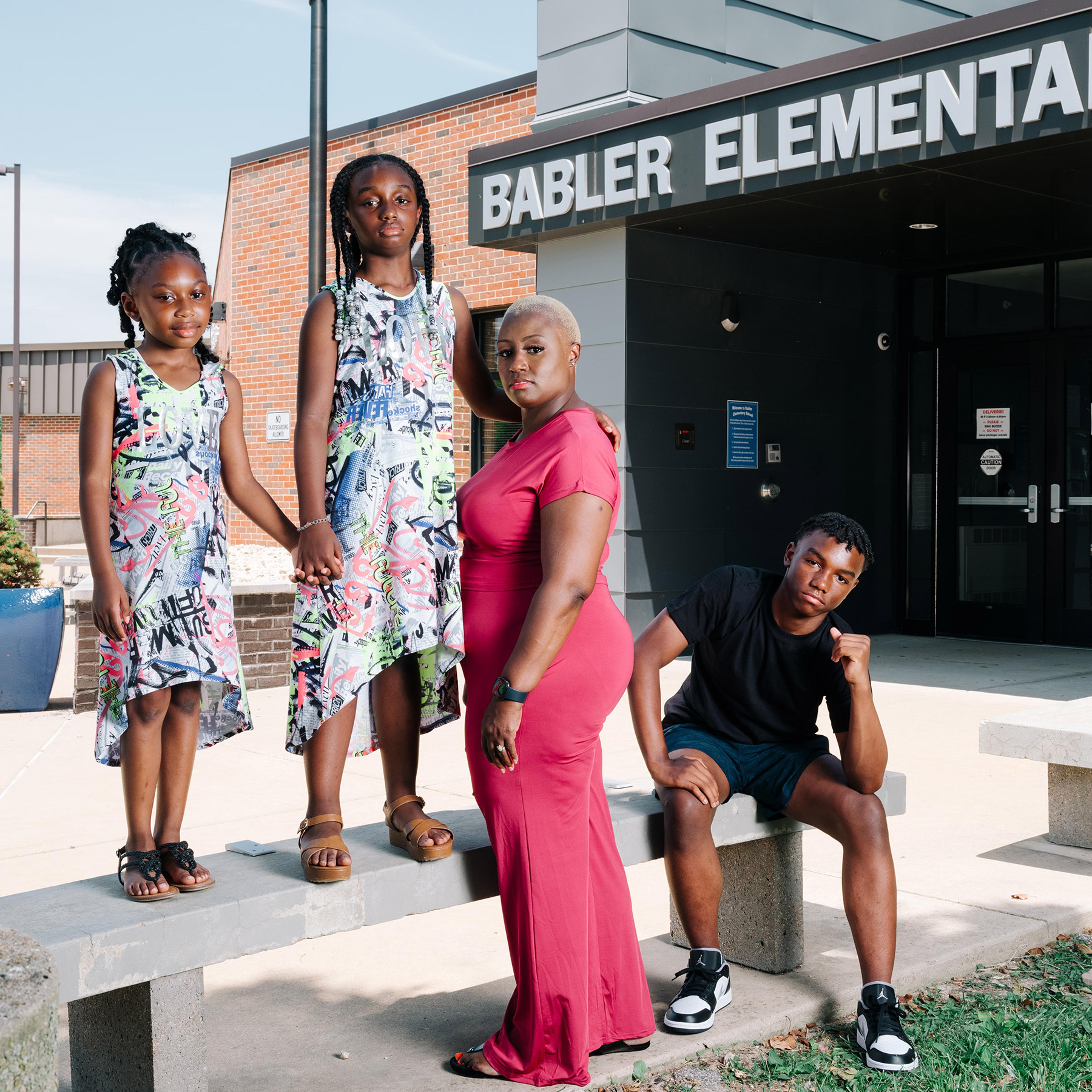 "If we can’t have these hard conversations, how can we possibly expect our children to?" Shemia Reese with her family at Babler Elementary in Glencoe, Mo., on June 18.