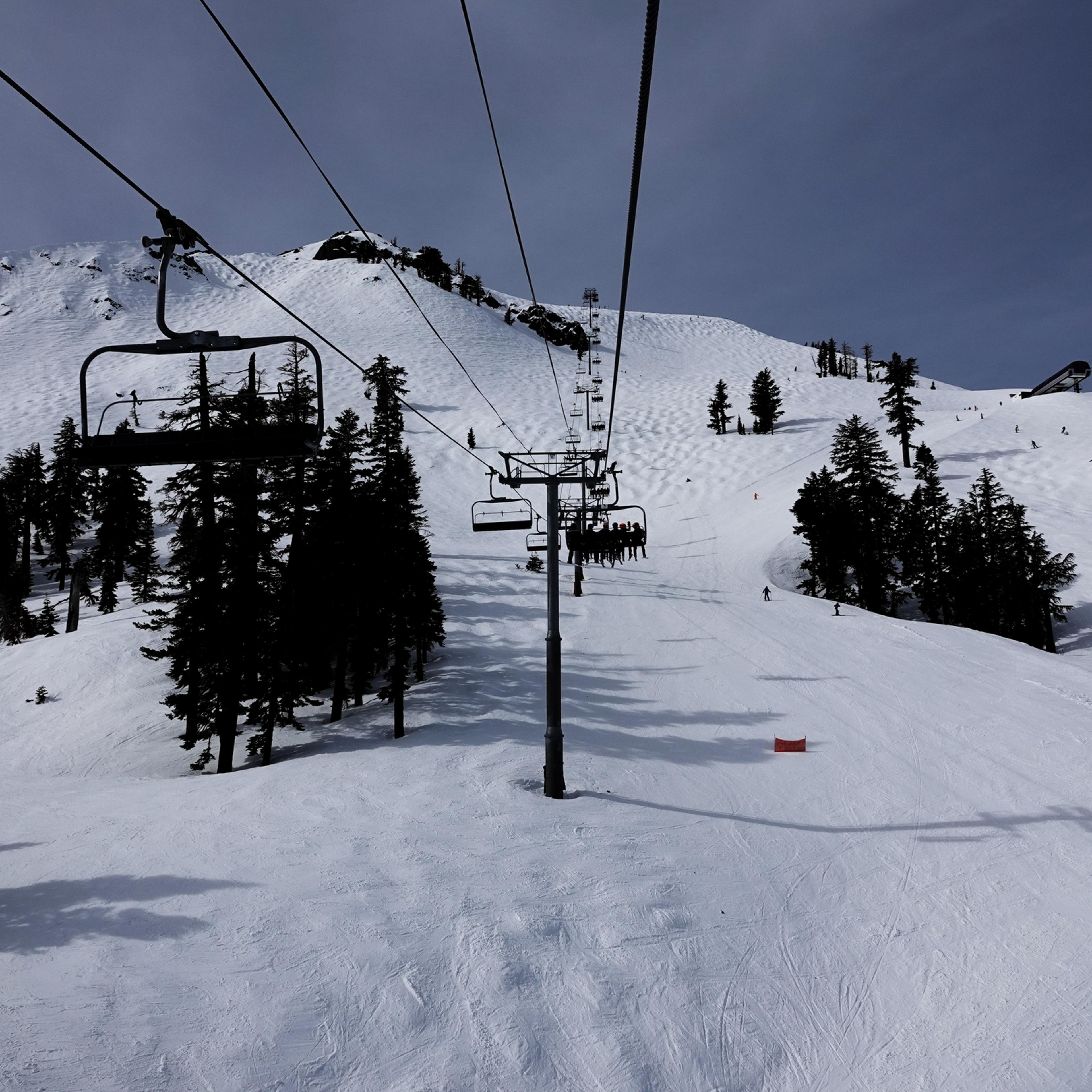 Ski lift view of Palisades Tahoe ski resort, California.