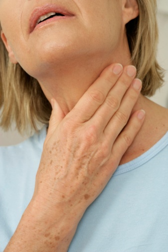 woman-touching-neck