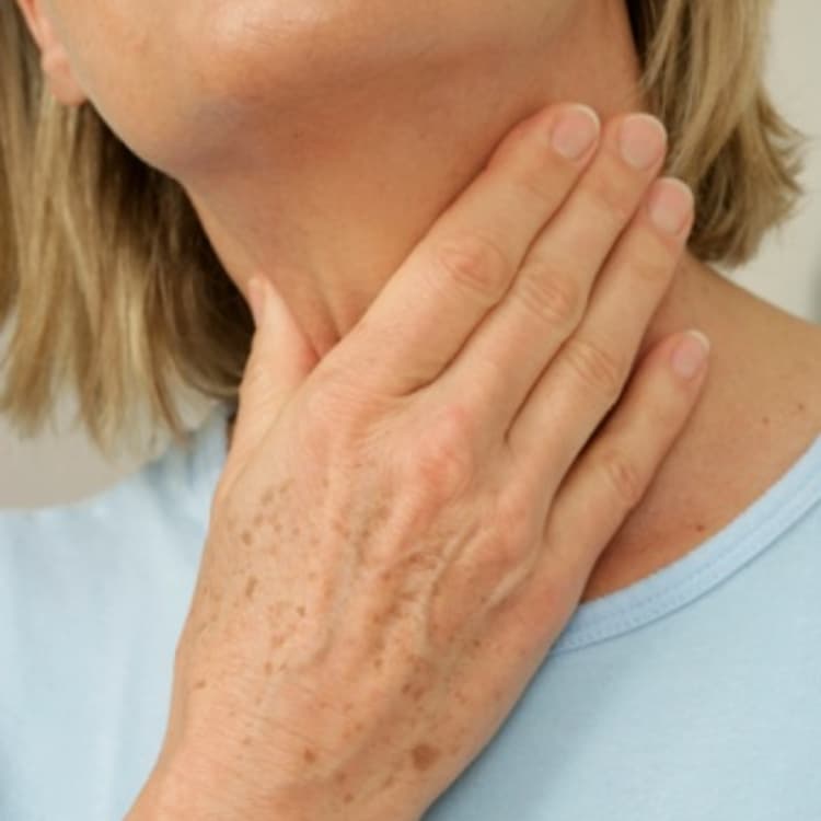 woman-touching-neck