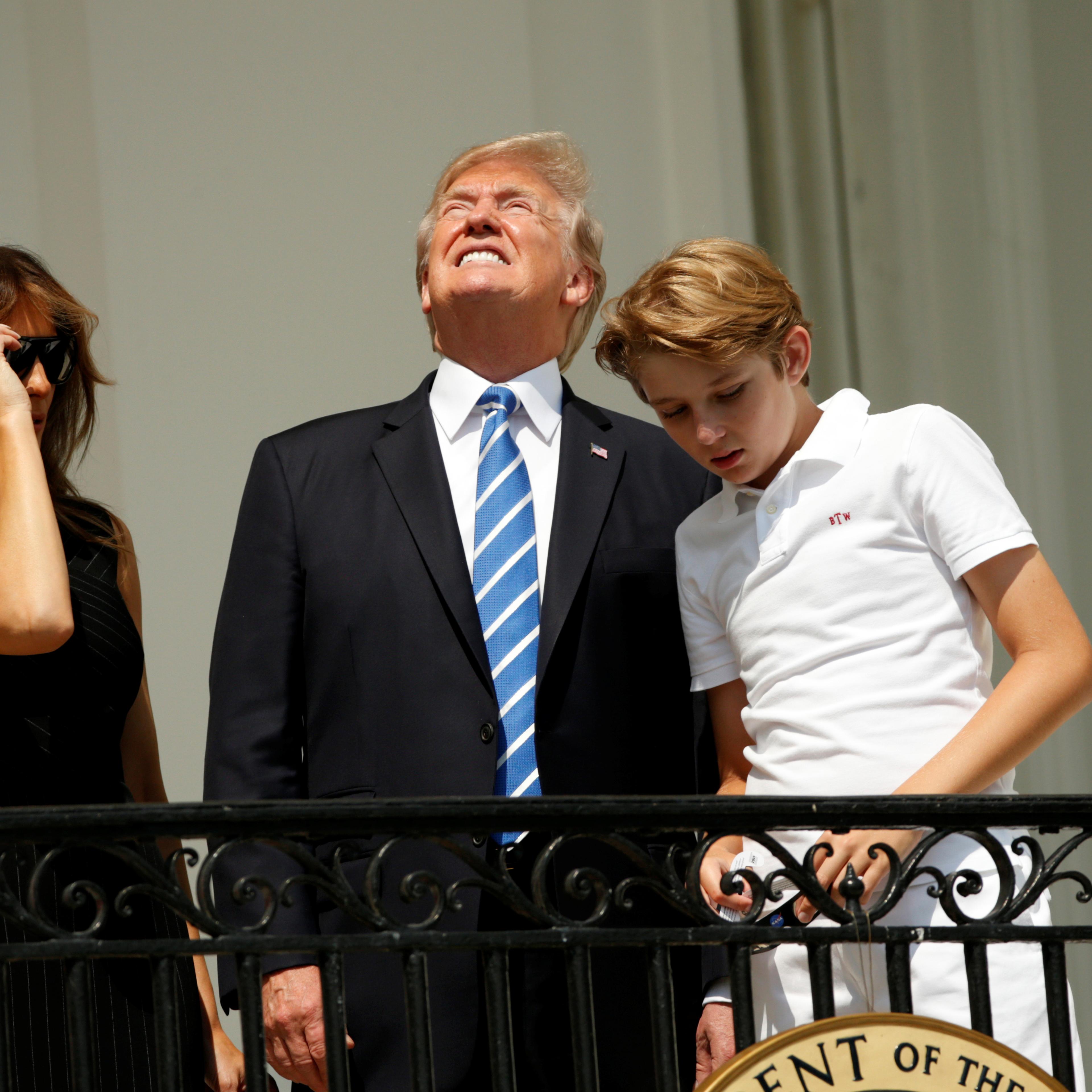 U.S. President Trump and family watch the solar eclipse from the White House in Washington
