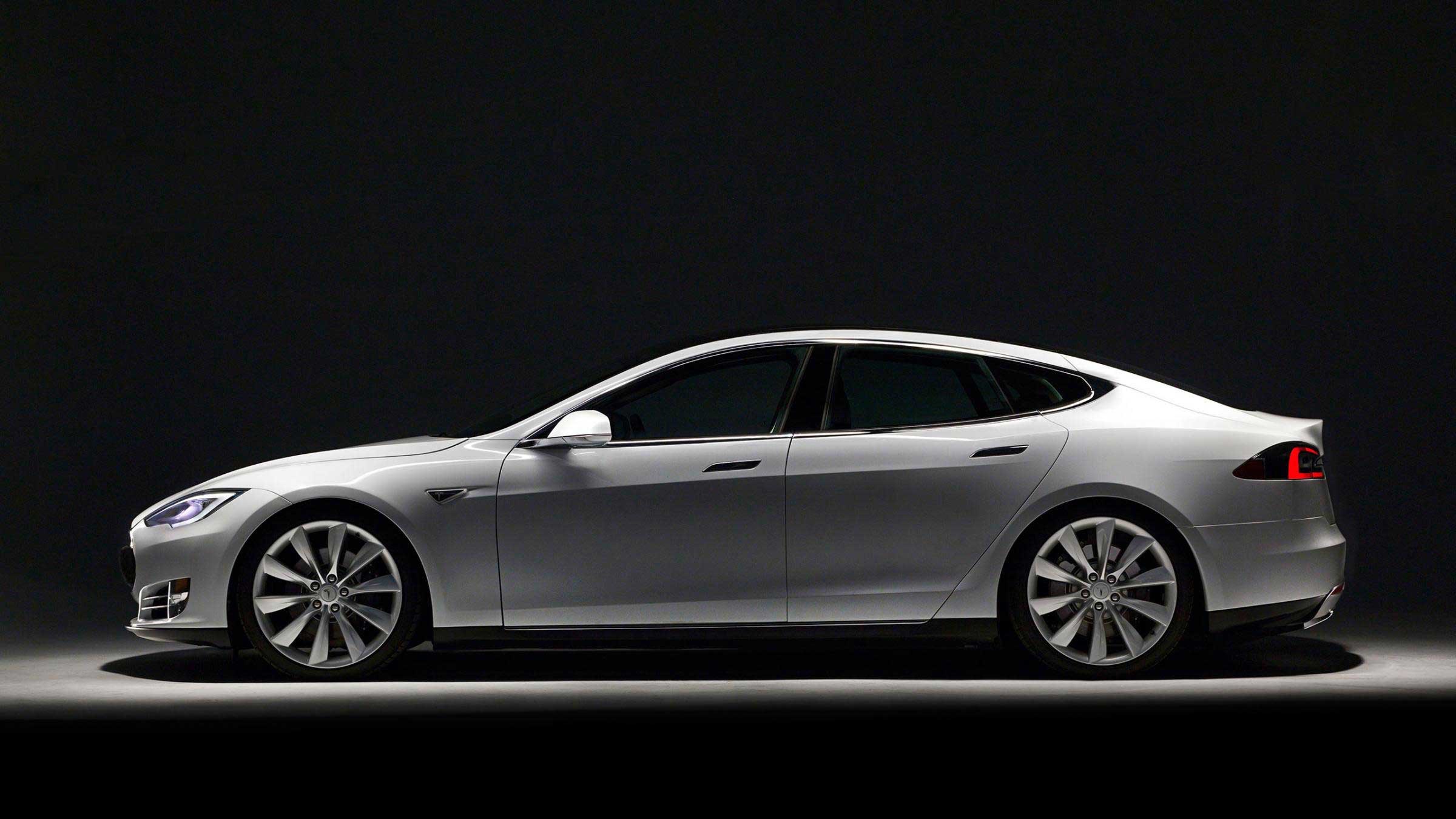 Tesla 2014 Model S  Tesla 2014 Model S has been praised both for its luxury feel and high-tech interior. The electric car offers instantaneous acceleration from a stop, a function very few other cars on the market provide. 