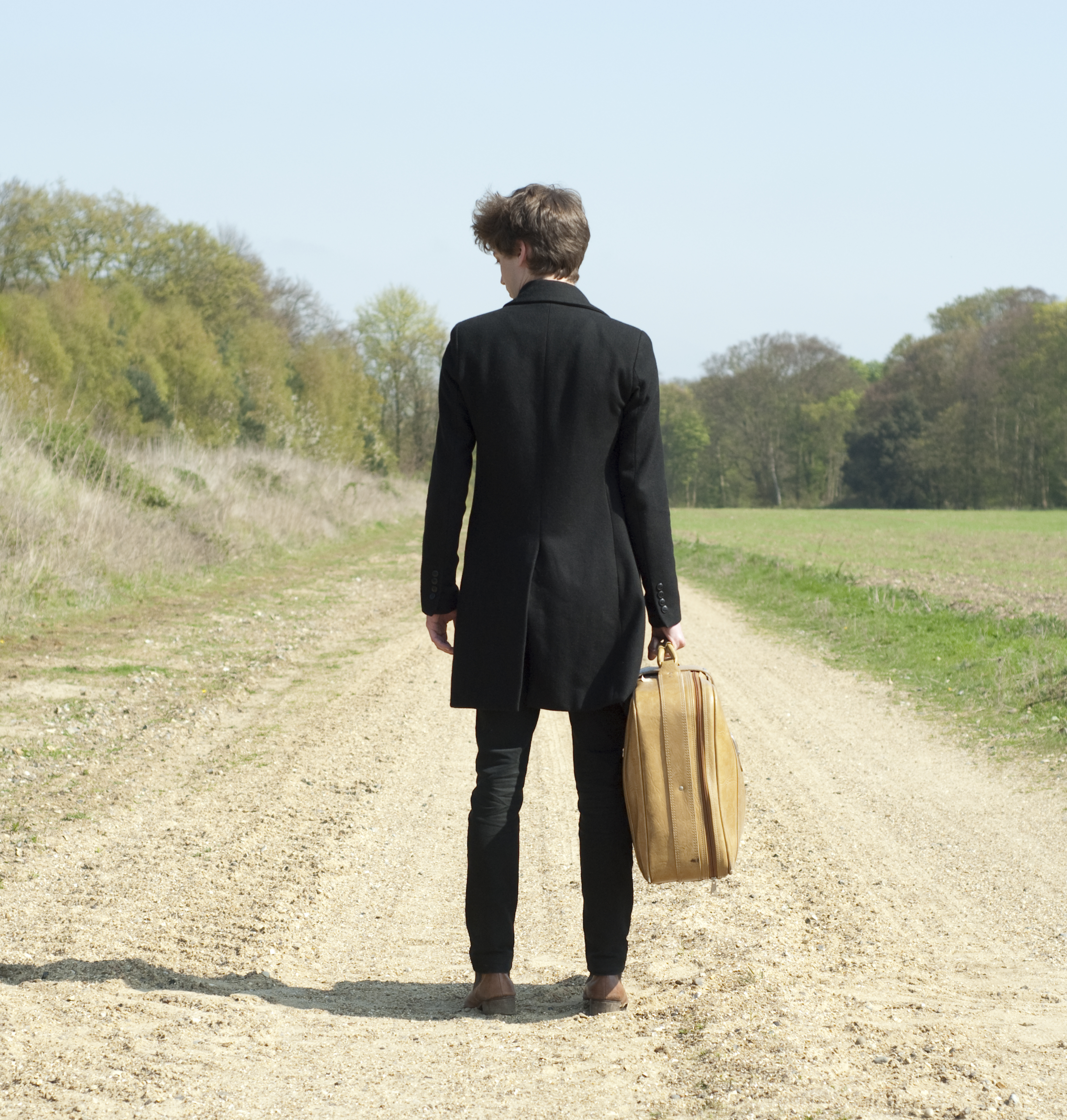man-leaving-rearview