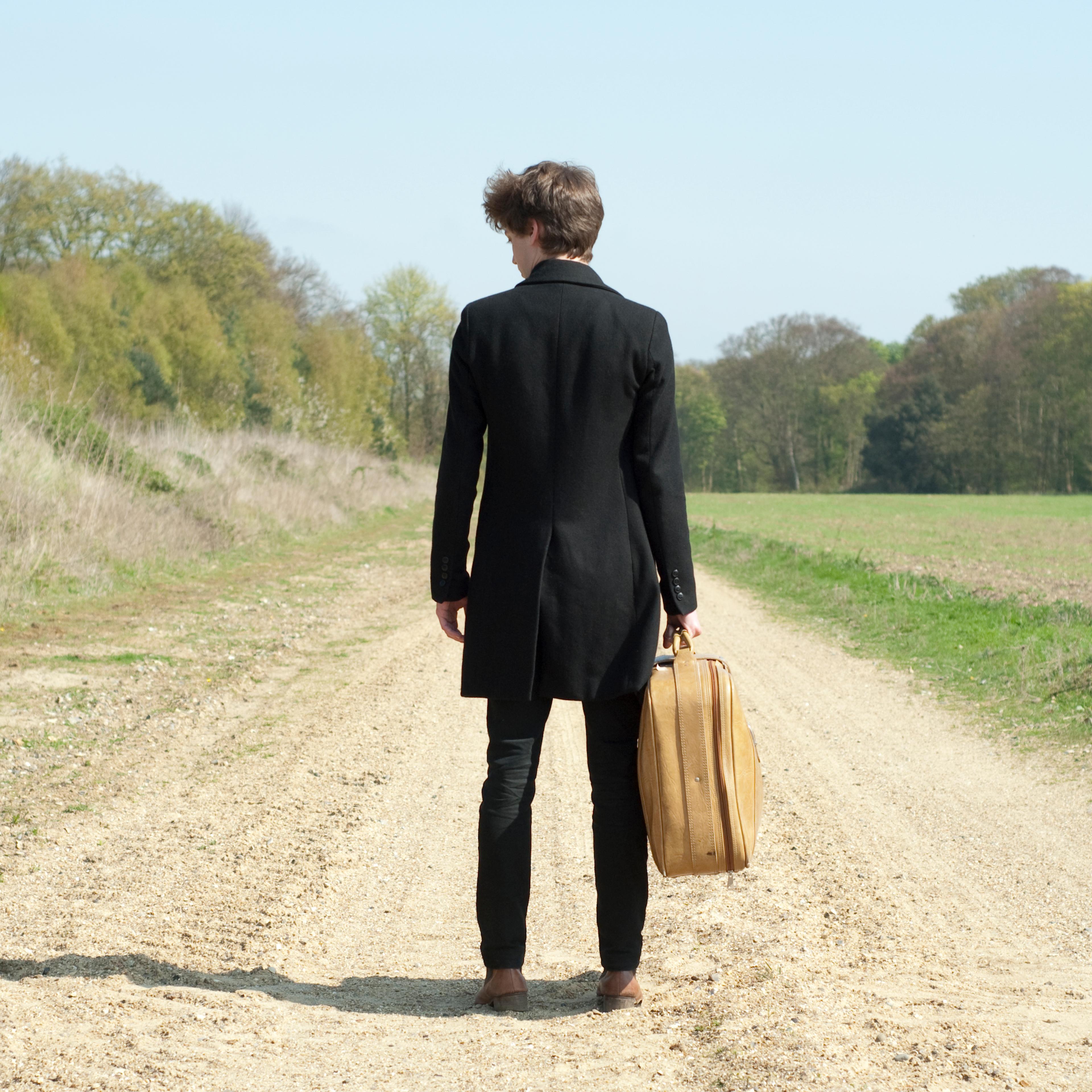 man-leaving-rearview
