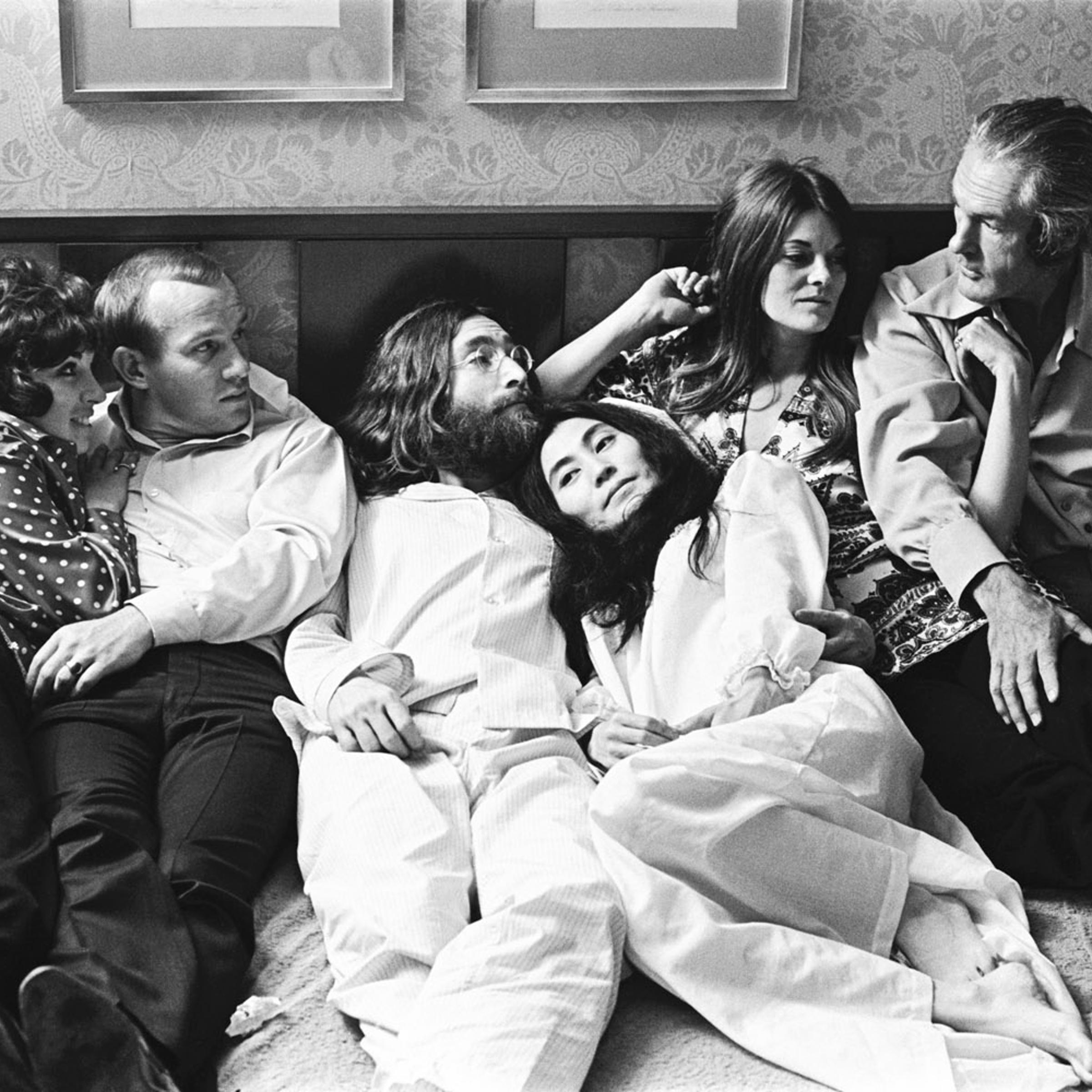 The following photographs are previously unseen images of John Lennon and Yoko Ono during their "Bed In" for peace at Montreal's Queen Elizabeth Hotel in June 1969. Here, Tommy Smothers, an unknown friend, John Lennon, Yoko Ono, Rosemary Leary and Timothy Leary.