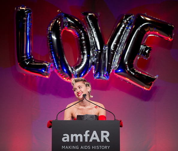 Miley Cyrus gives a speech at the 2015 amfAR Inspiration Gala in New York City on June 16, 2015.