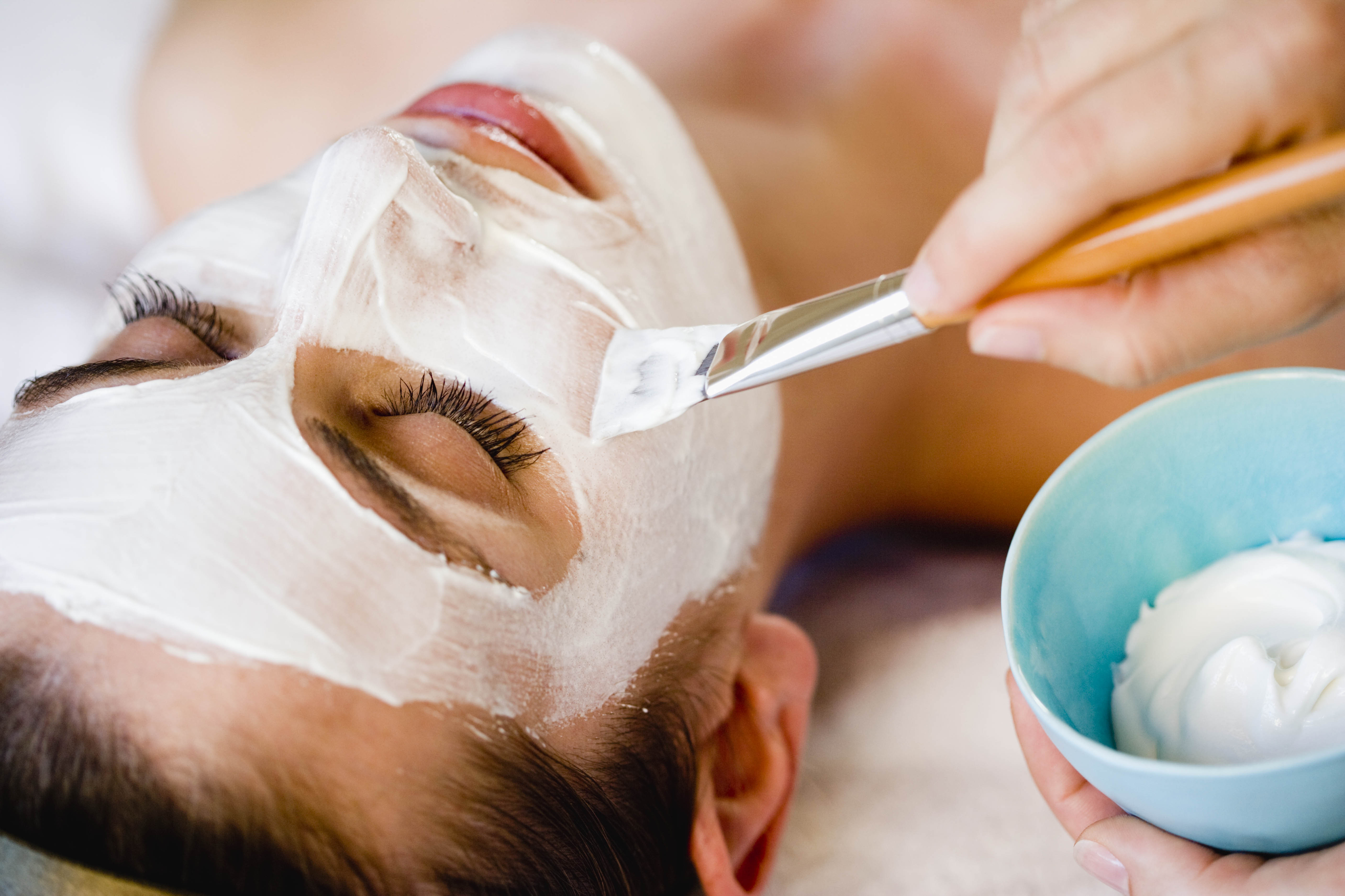 Woman is getting a face mask