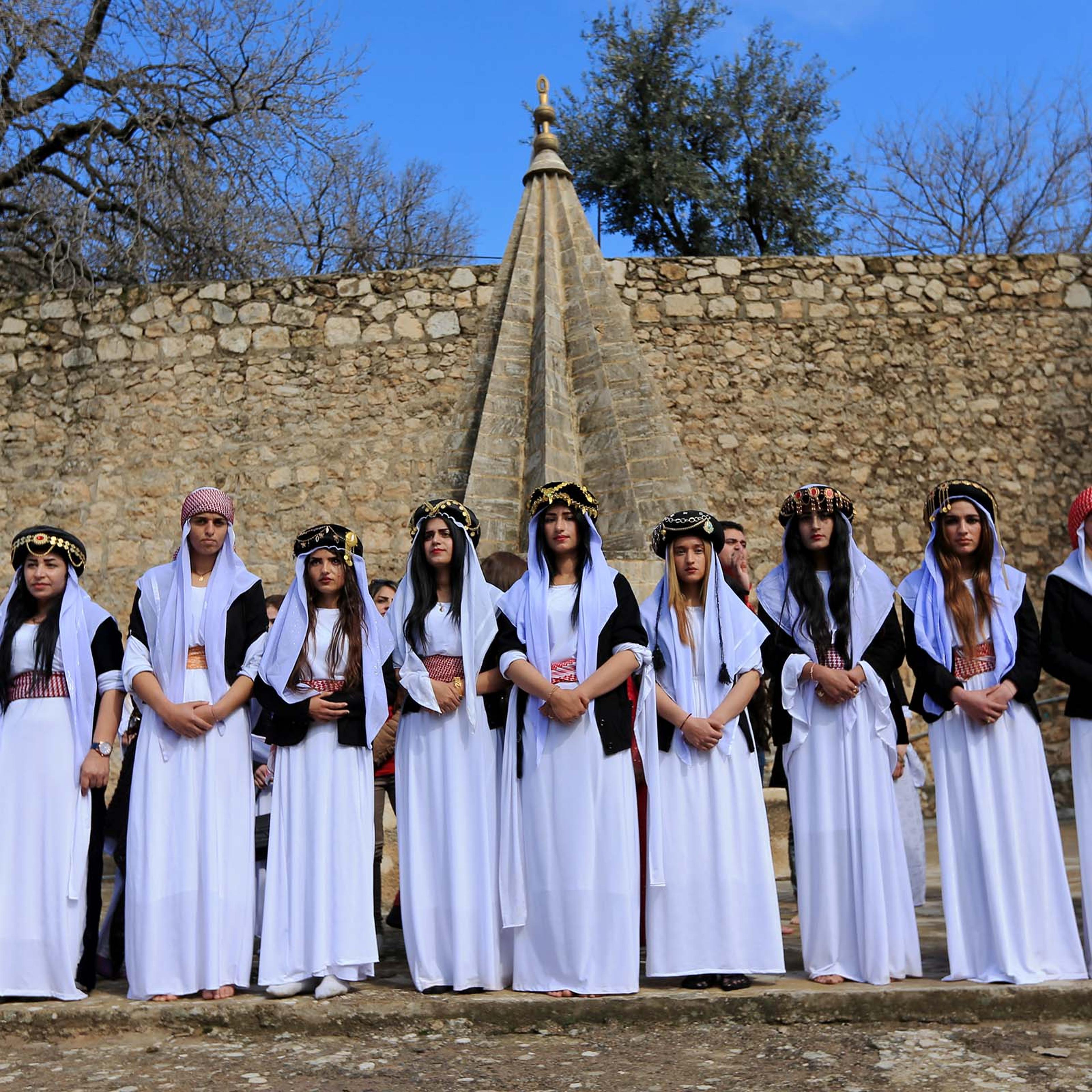 Yazidi's women attend a ceremony at Lilash Temple to commemorate the death of women who were killed by Islamic State militants, during the International Women Day, in Shikhan