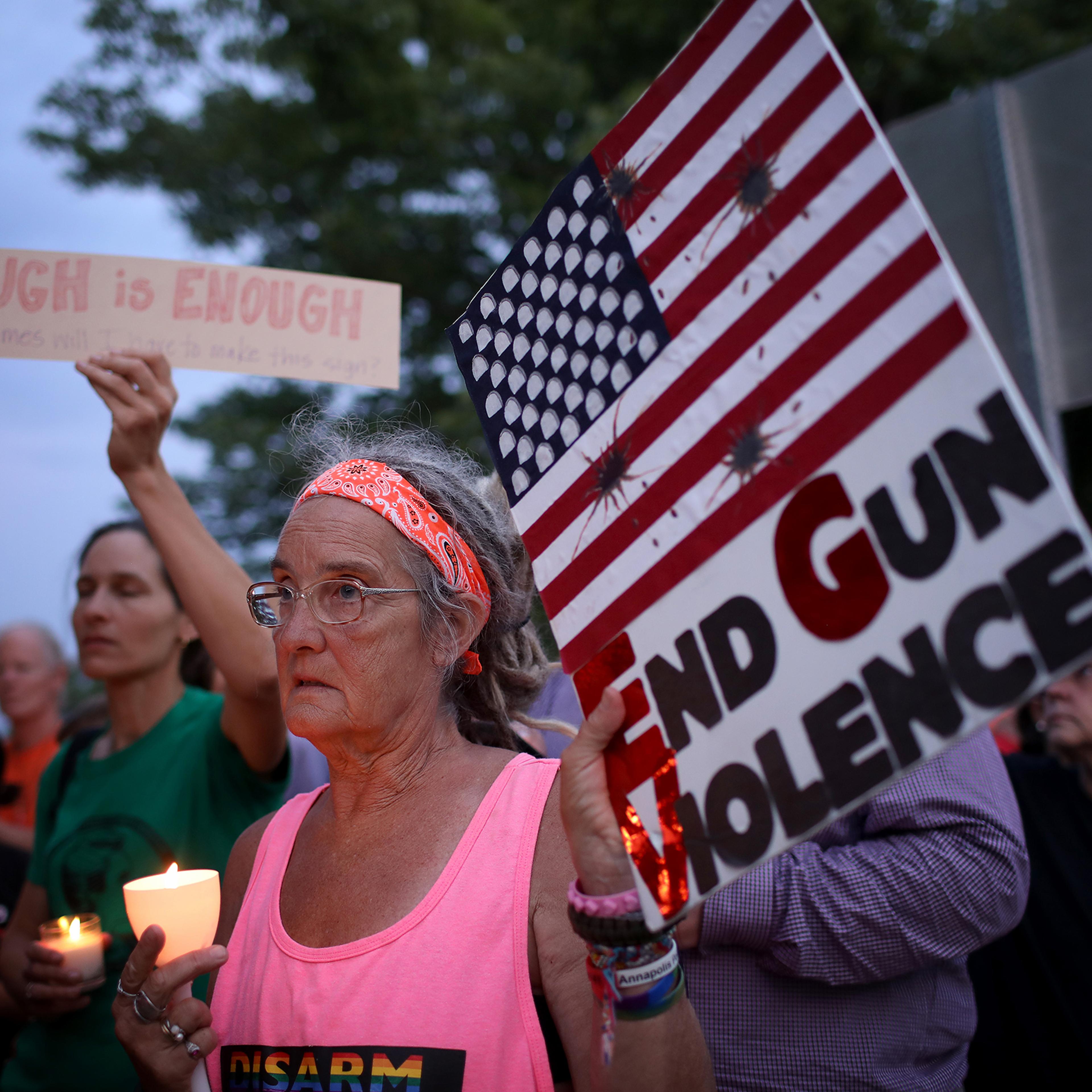 Vigil Held Outside NRA HQ For Mass Shooting Victims In Dayton And El Paso