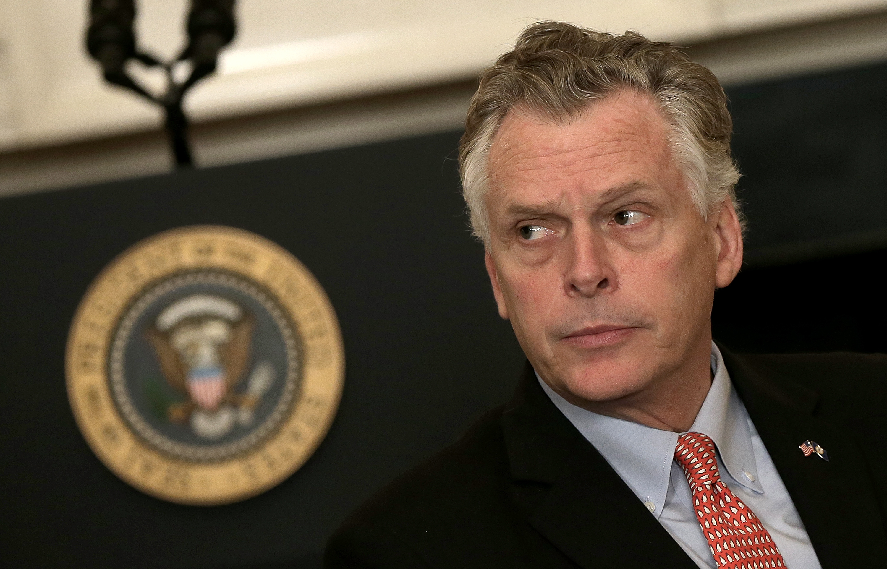 Virginia Gov. Terry McAuliffe waits for President Obama to address members of the National Governors Association at the White House in Washington, D.C., Feb. 23, 2015.