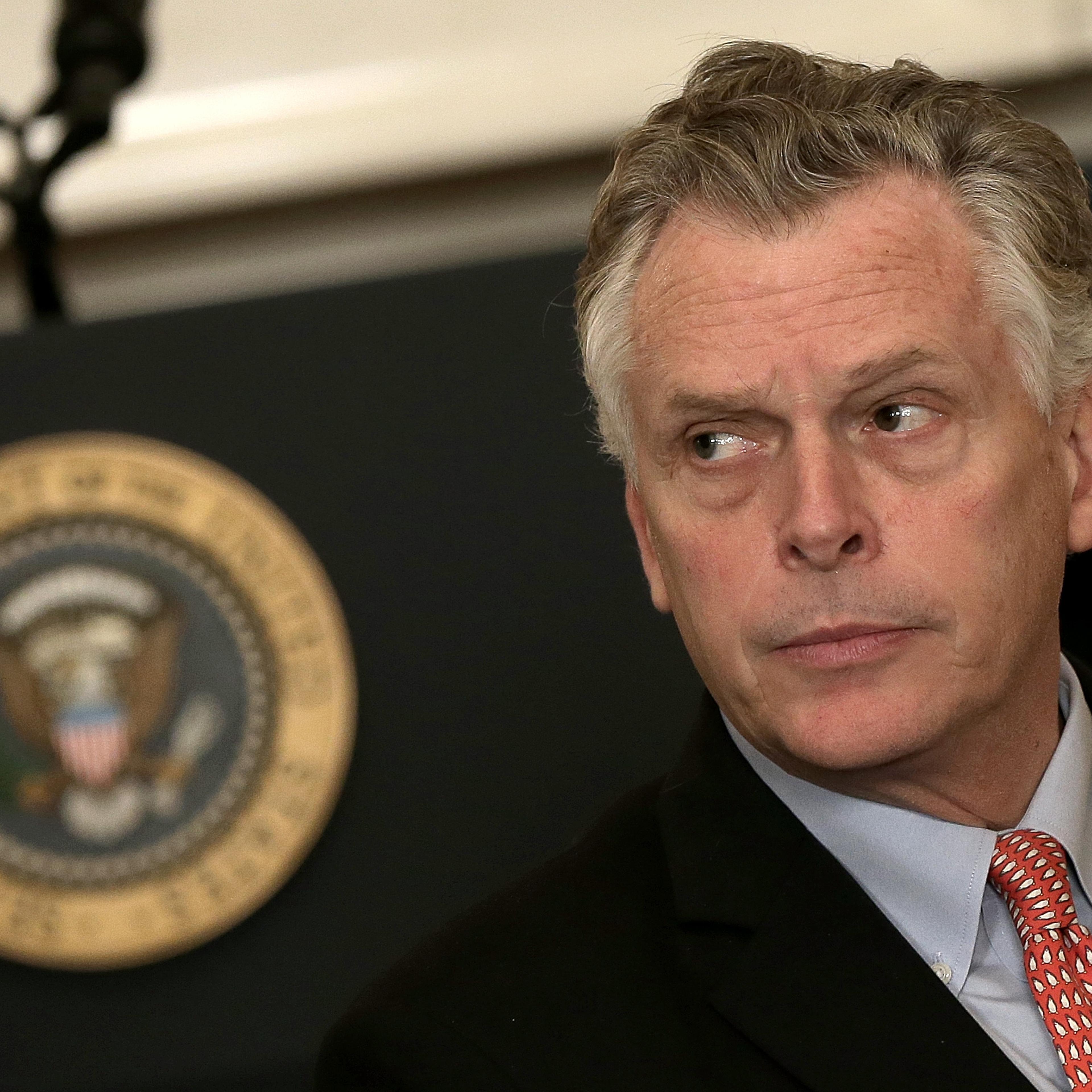Virginia Gov. Terry McAuliffe waits for President Obama to address members of the National Governors Association at the White House in Washington, D.C., Feb. 23, 2015.